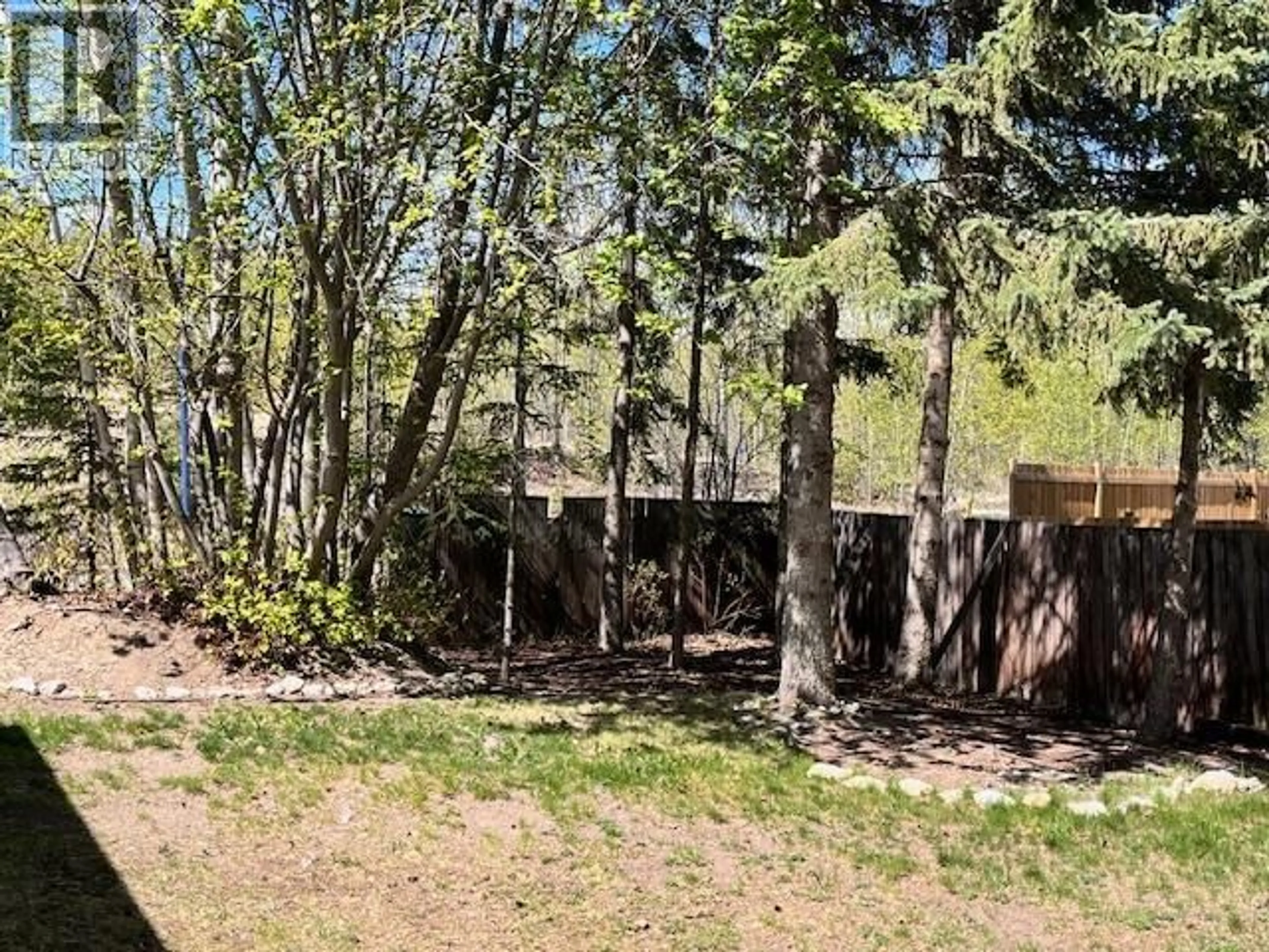 A pic from outside/outdoor area/front of a property/back of a property/a pic from drone, forest/trees view for 1417 LEWIS DRIVE, Quesnel British Columbia V2J5T5