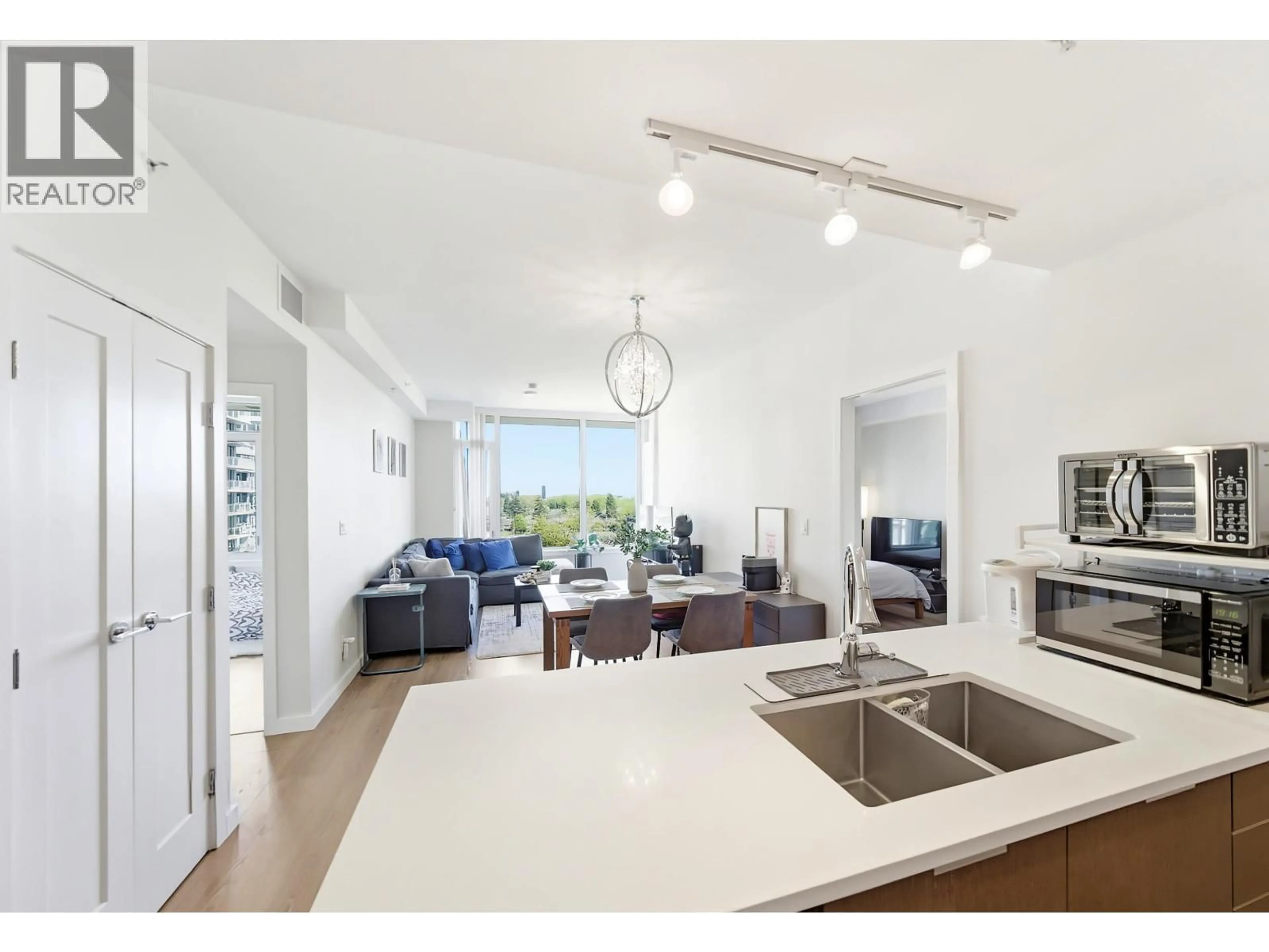 Open concept kitchen, unknown for 911 - 3333 SEXSMITH ROAD, Richmond British Columbia V6X0R7