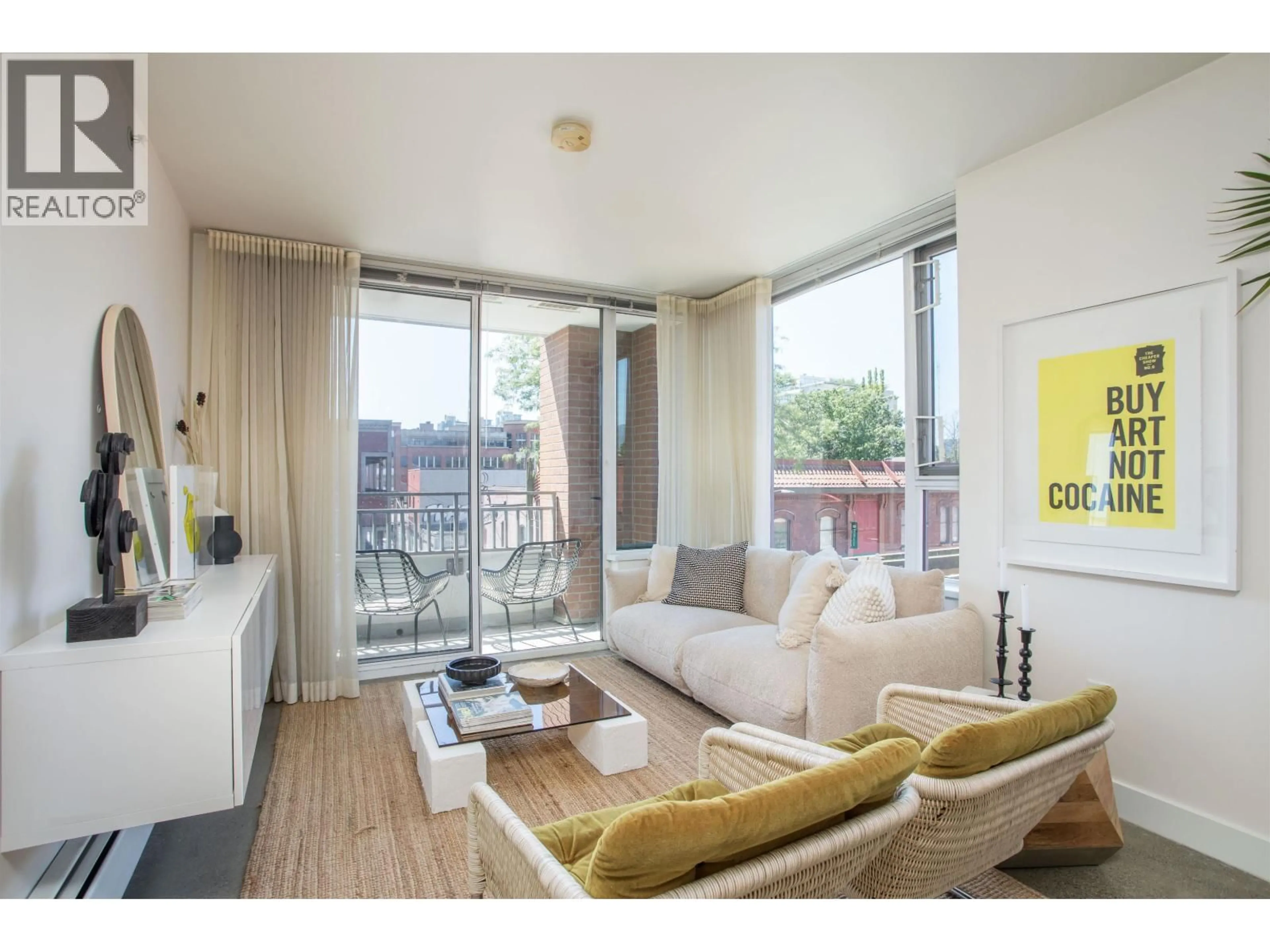 Living room with furniture, wood/laminate floor for 307 - 231 PENDER STREET, Vancouver British Columbia V6A0G3