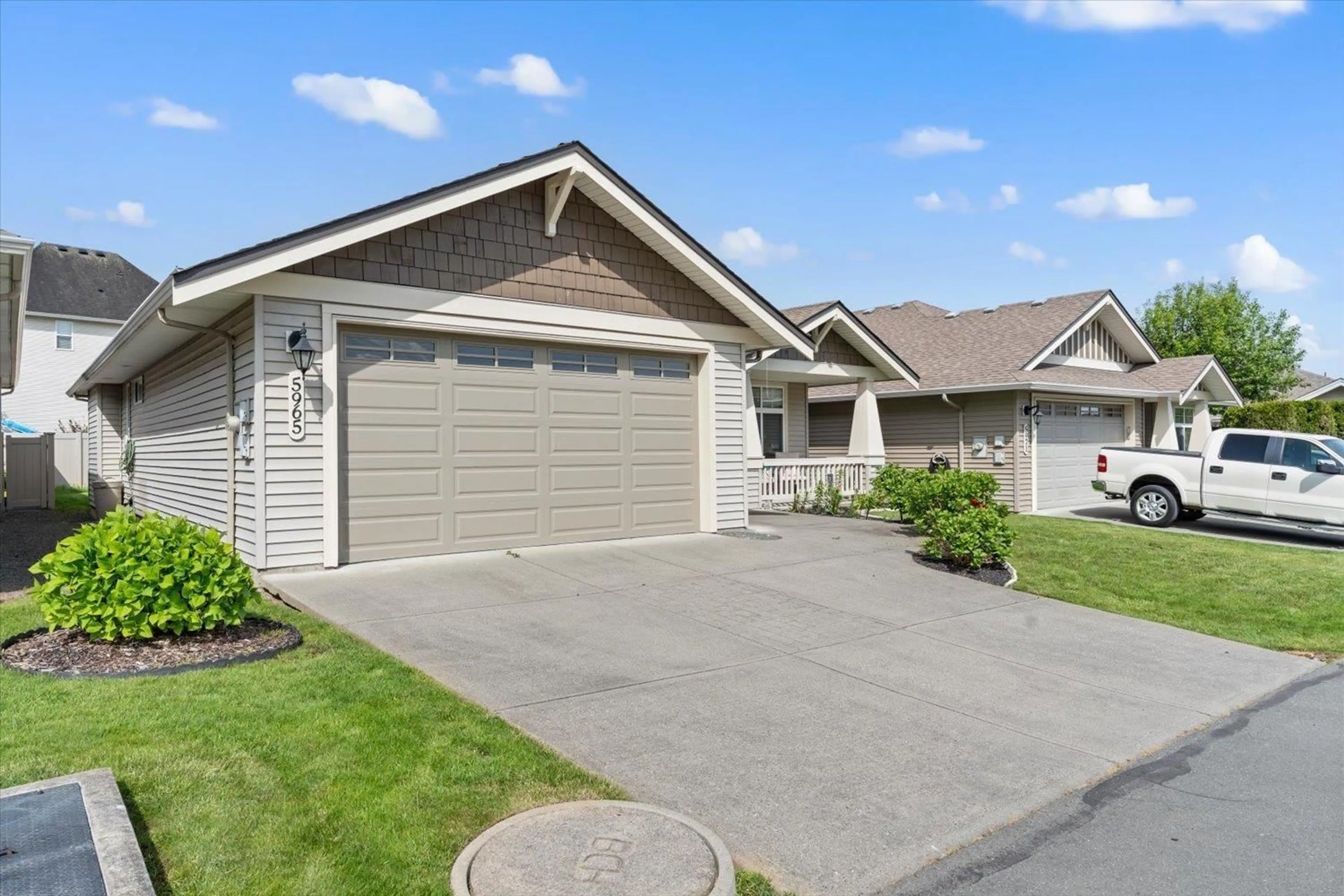 Home with vinyl exterior material, street for 5965 RIVERSTONE STREET, Chilliwack British Columbia V2R0E2