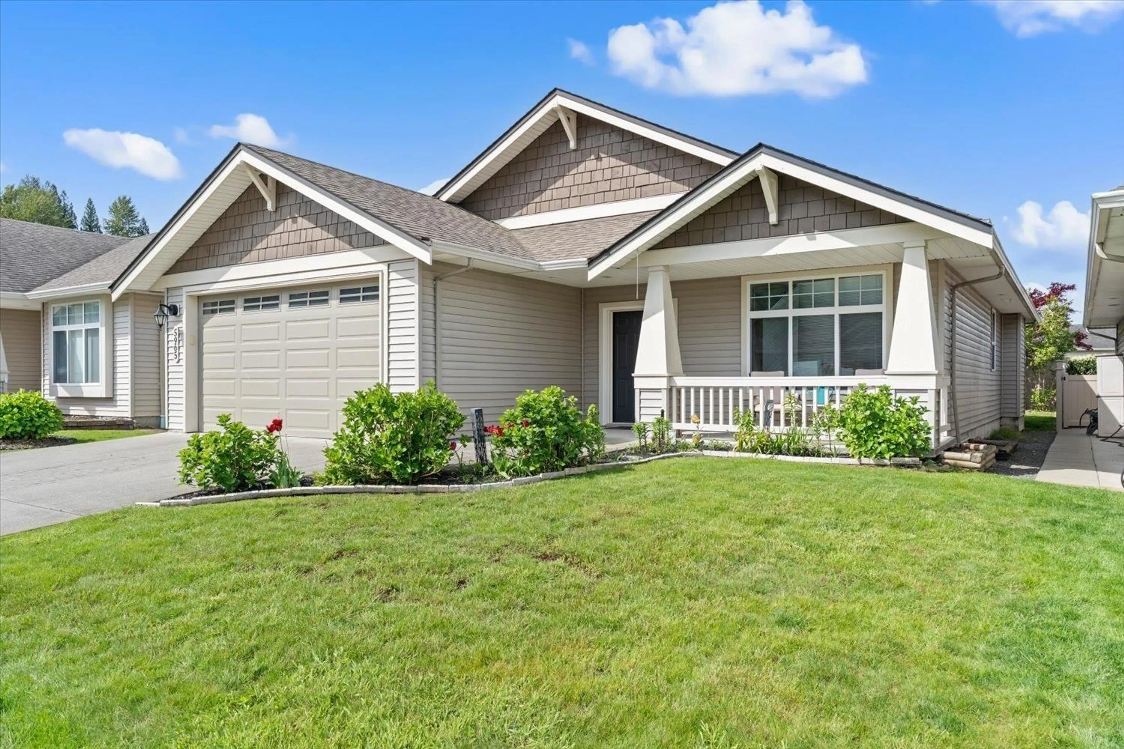 Home with vinyl exterior material, street for 5965 RIVERSTONE STREET, Chilliwack British Columbia V2R0E2