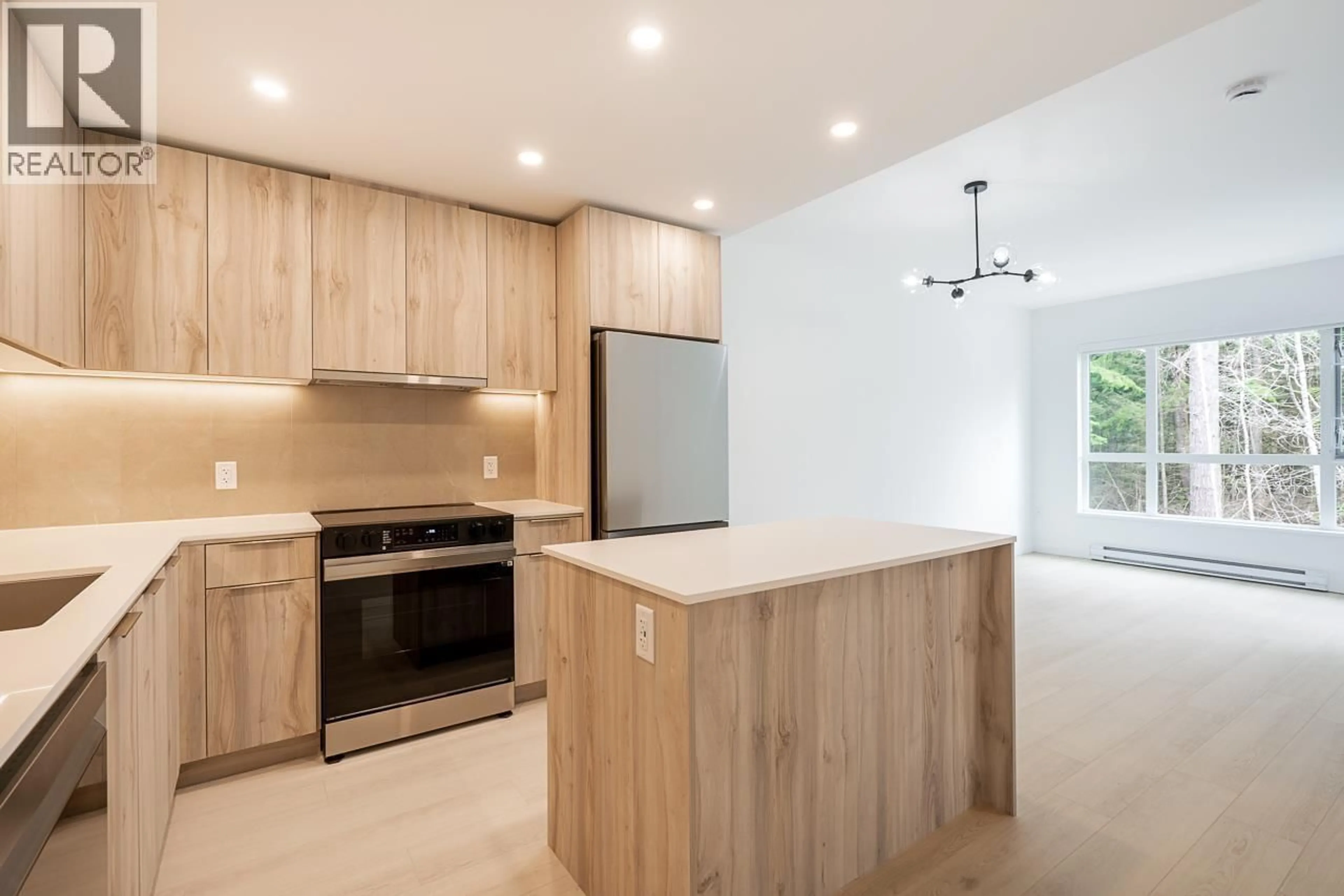 Open concept kitchen, unknown for 412 - 3596 MALSUM DRIVE, North Vancouver British Columbia V7G0B5