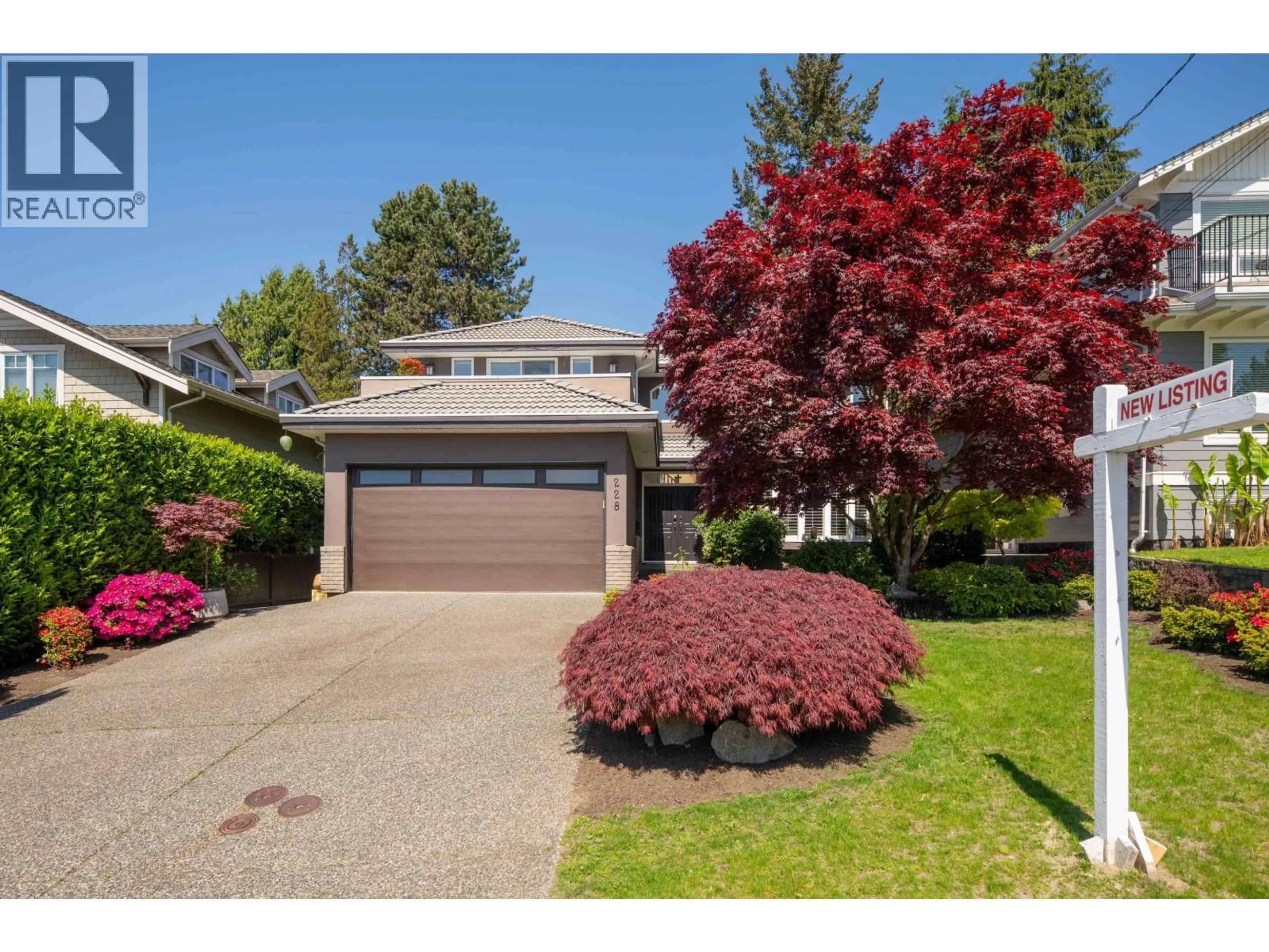 Home with vinyl exterior material, street for 228 KINGS ROAD, North Vancouver British Columbia V7N2L9