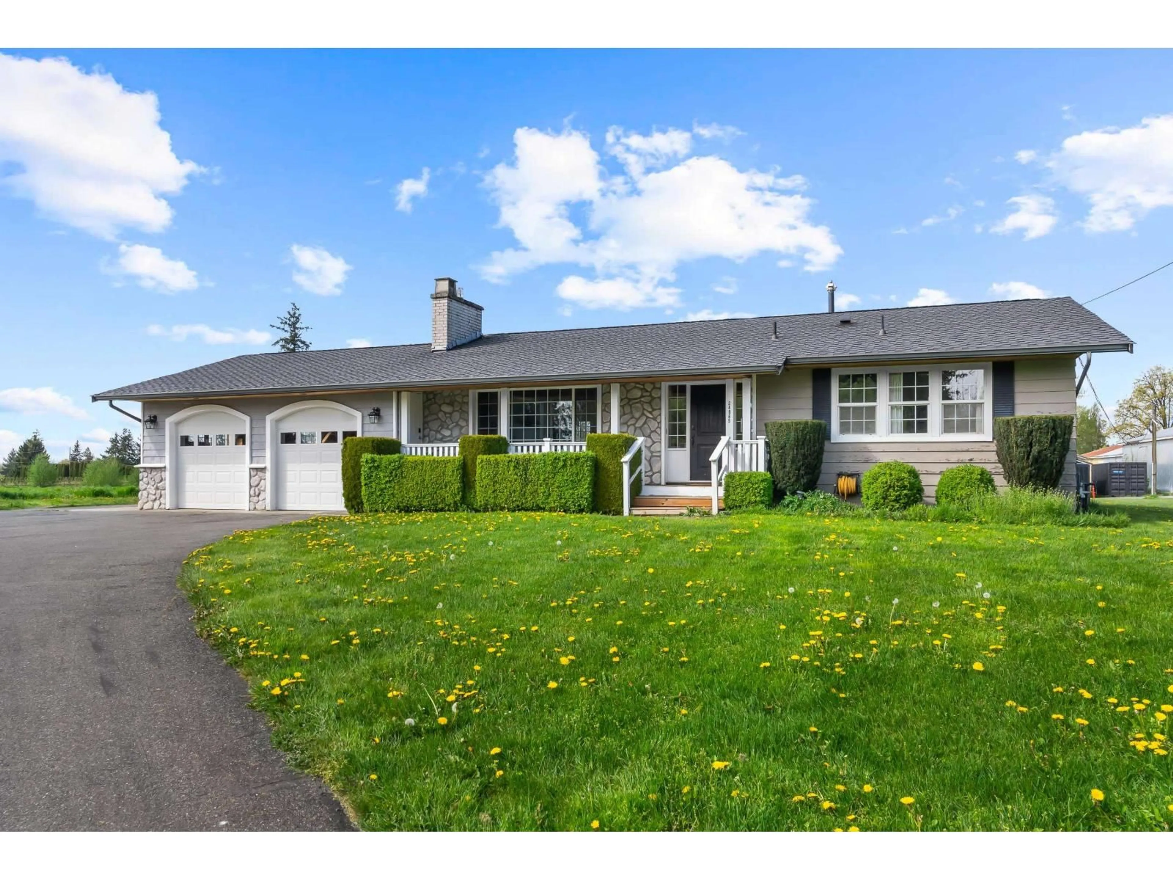 Home with vinyl exterior material, street for 24985 32 AVENUE, Langley British Columbia V4W2A1