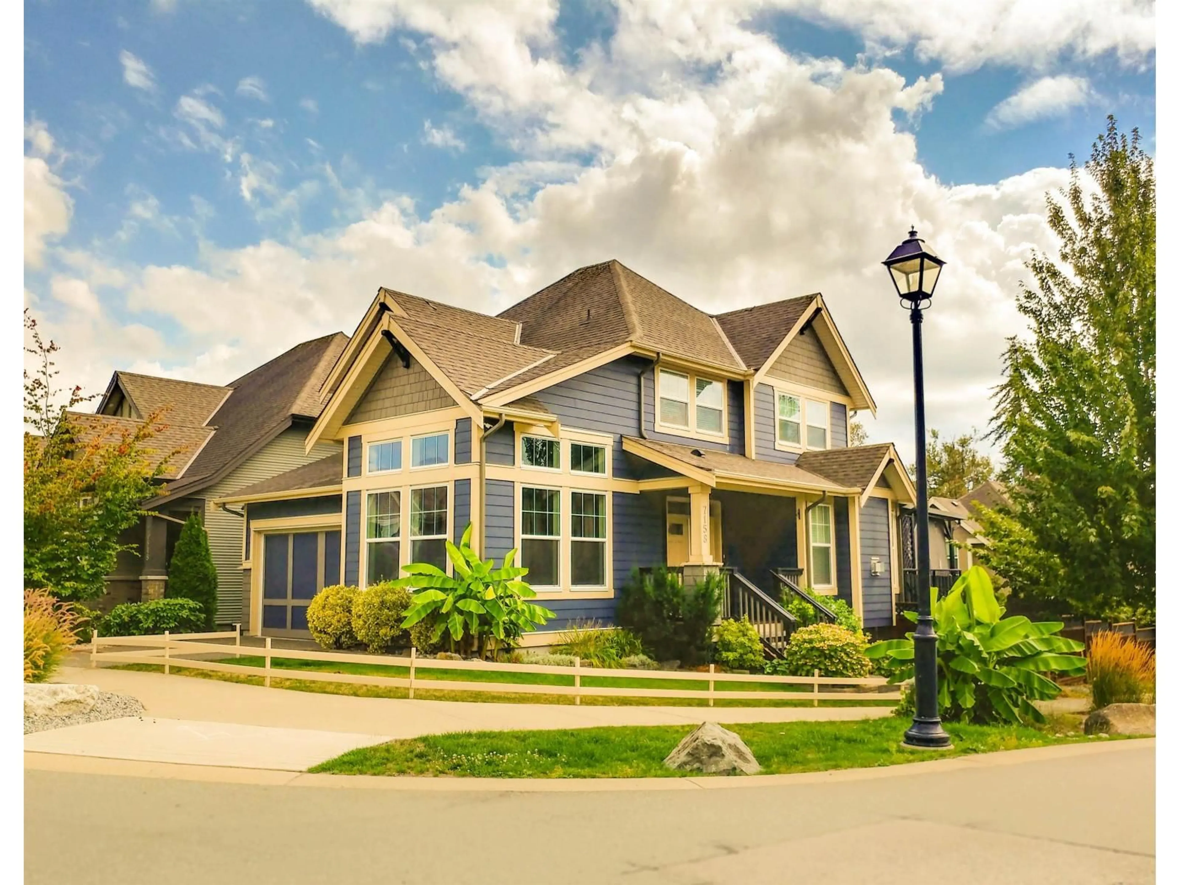 Home with vinyl exterior material, street for 7158 208A STREET, Langley British Columbia V2Y0J1