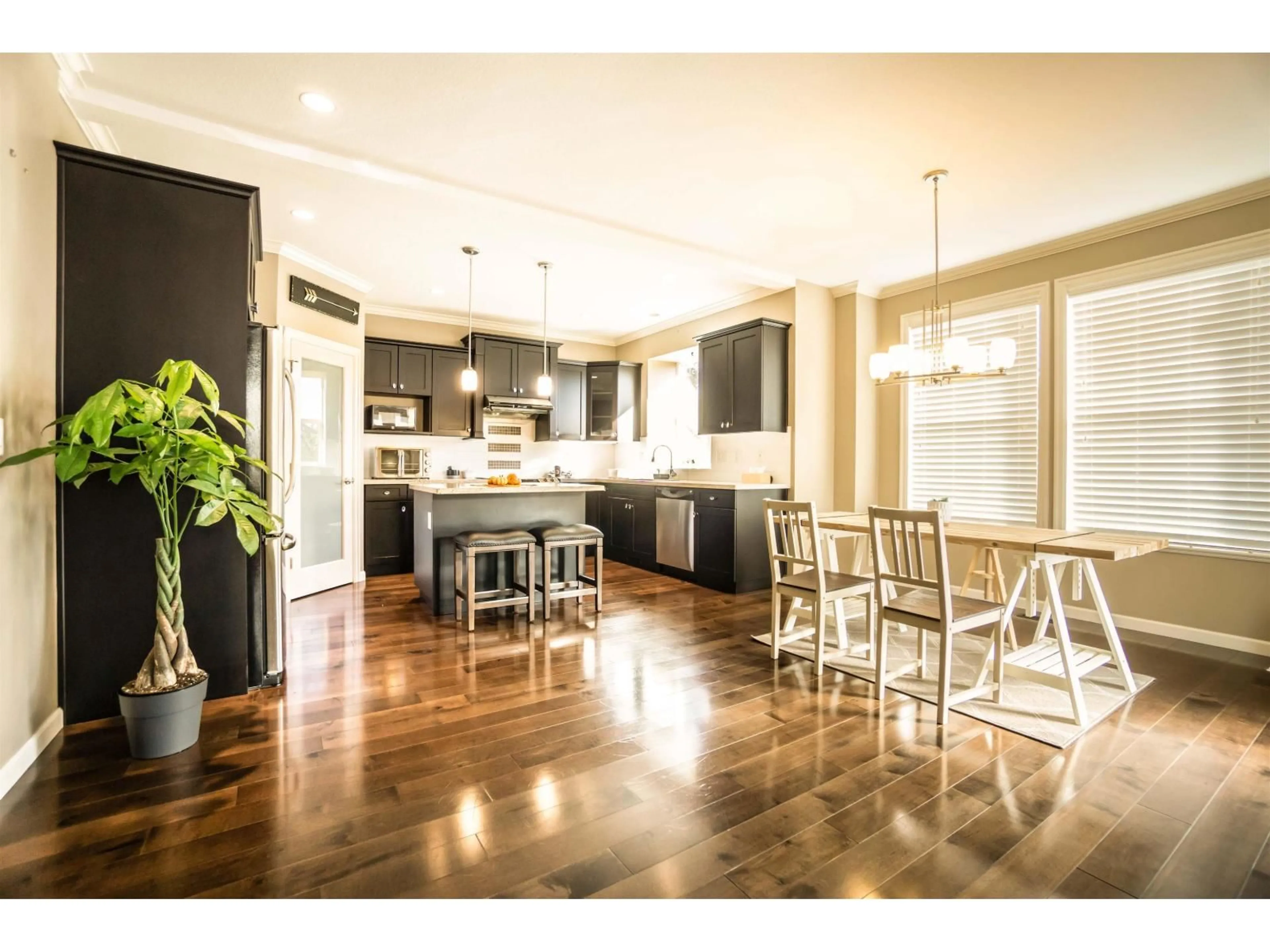 Open concept kitchen, wood/laminate floor for 7158 208A STREET, Langley British Columbia V2Y0J1