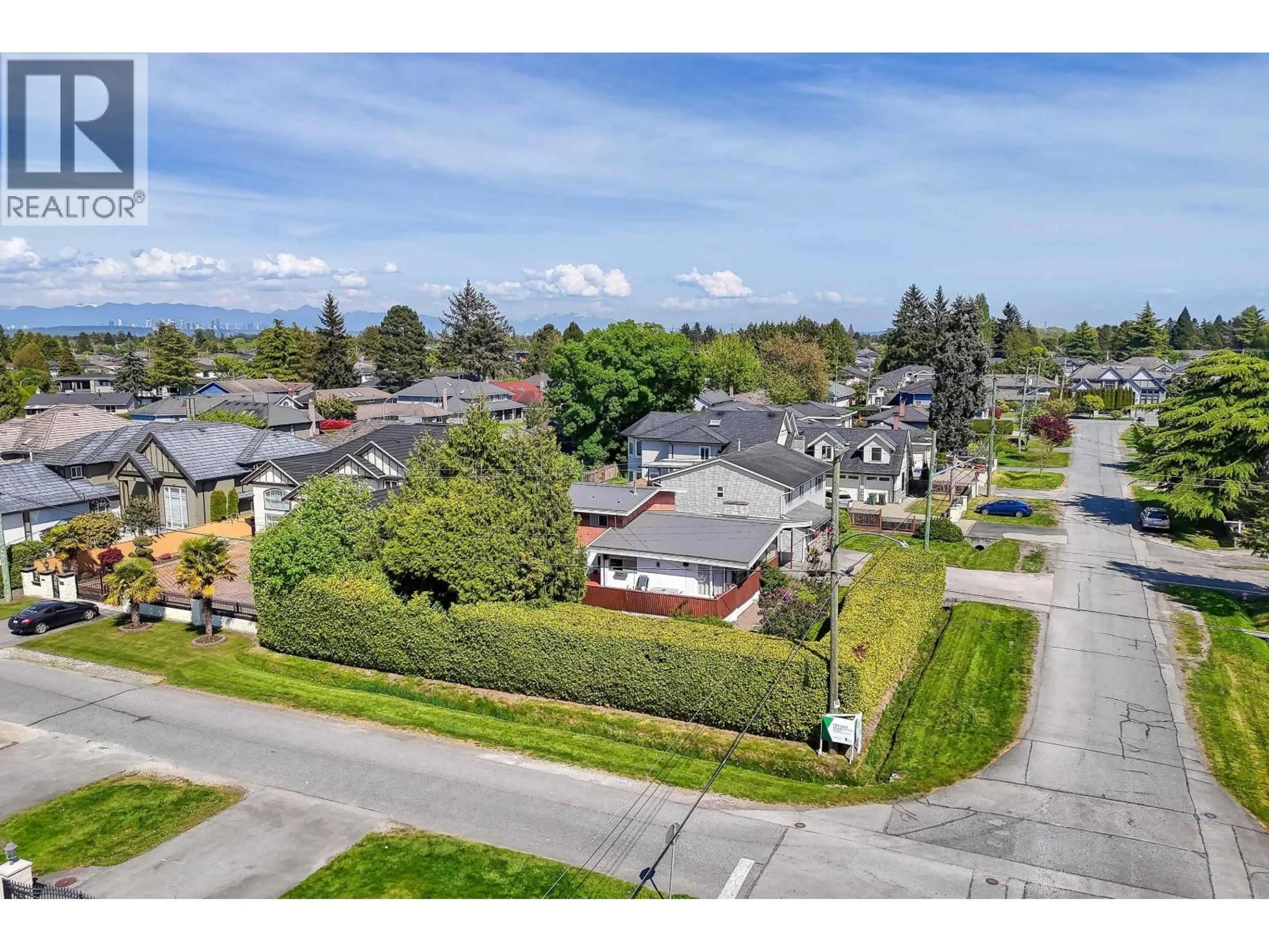 A pic from outside/outdoor area/front of a property/back of a property/a pic from drone, mountain view for 9791 BERRY ROAD, Richmond British Columbia V7A2M9