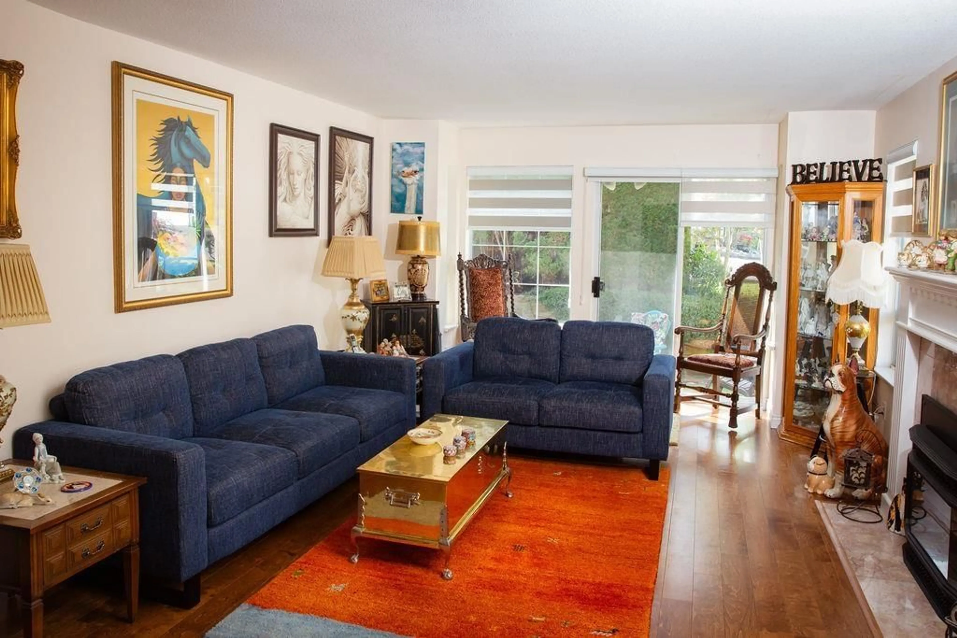 Living room with furniture, wood/laminate floor for 61 - 21848 50 AVENUE, Langley British Columbia V3A8A9