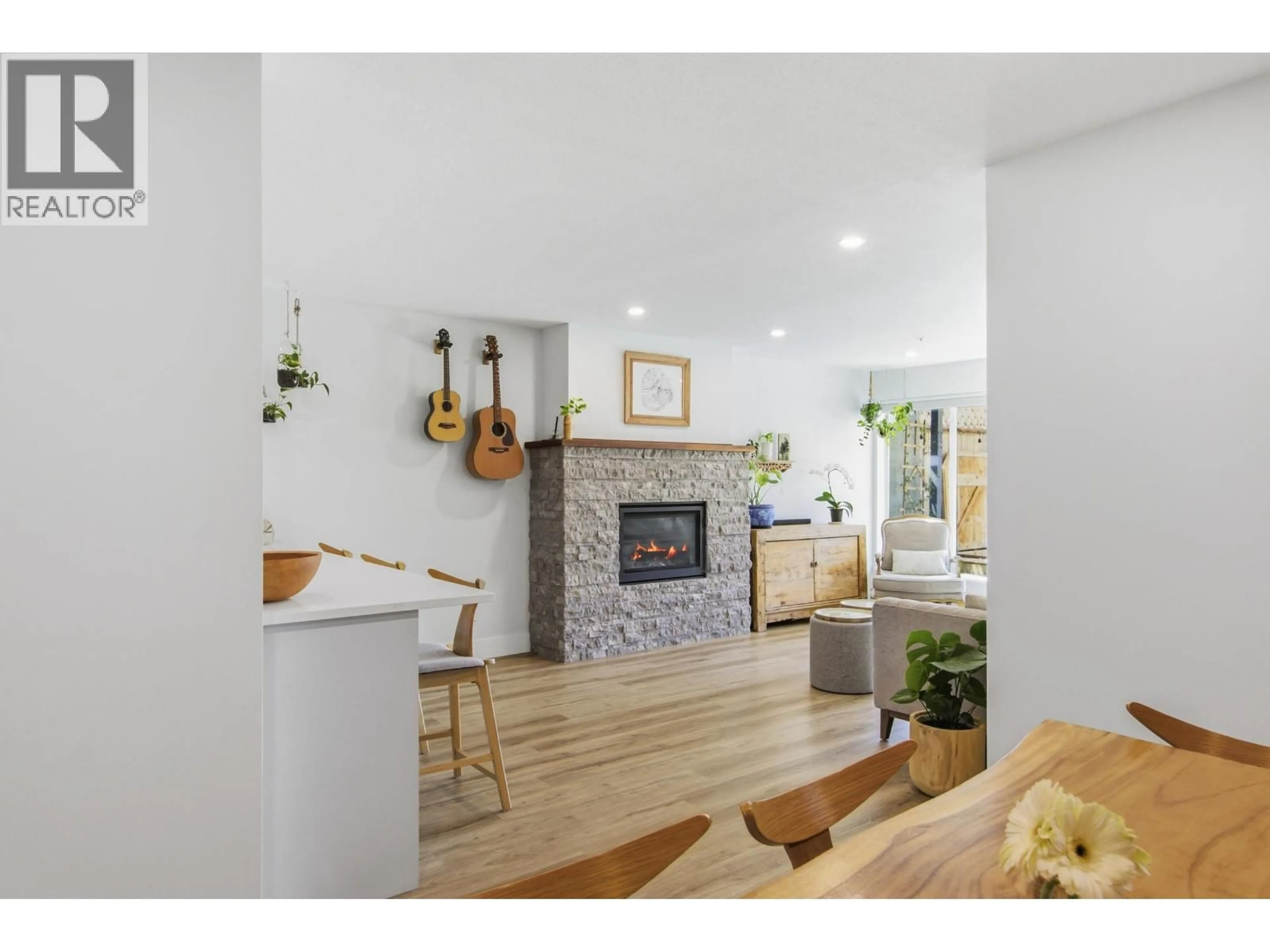 Open concept kitchen, wood/laminate floor for 108 - 3131 MAIN STREET, Vancouver British Columbia V5T3G8