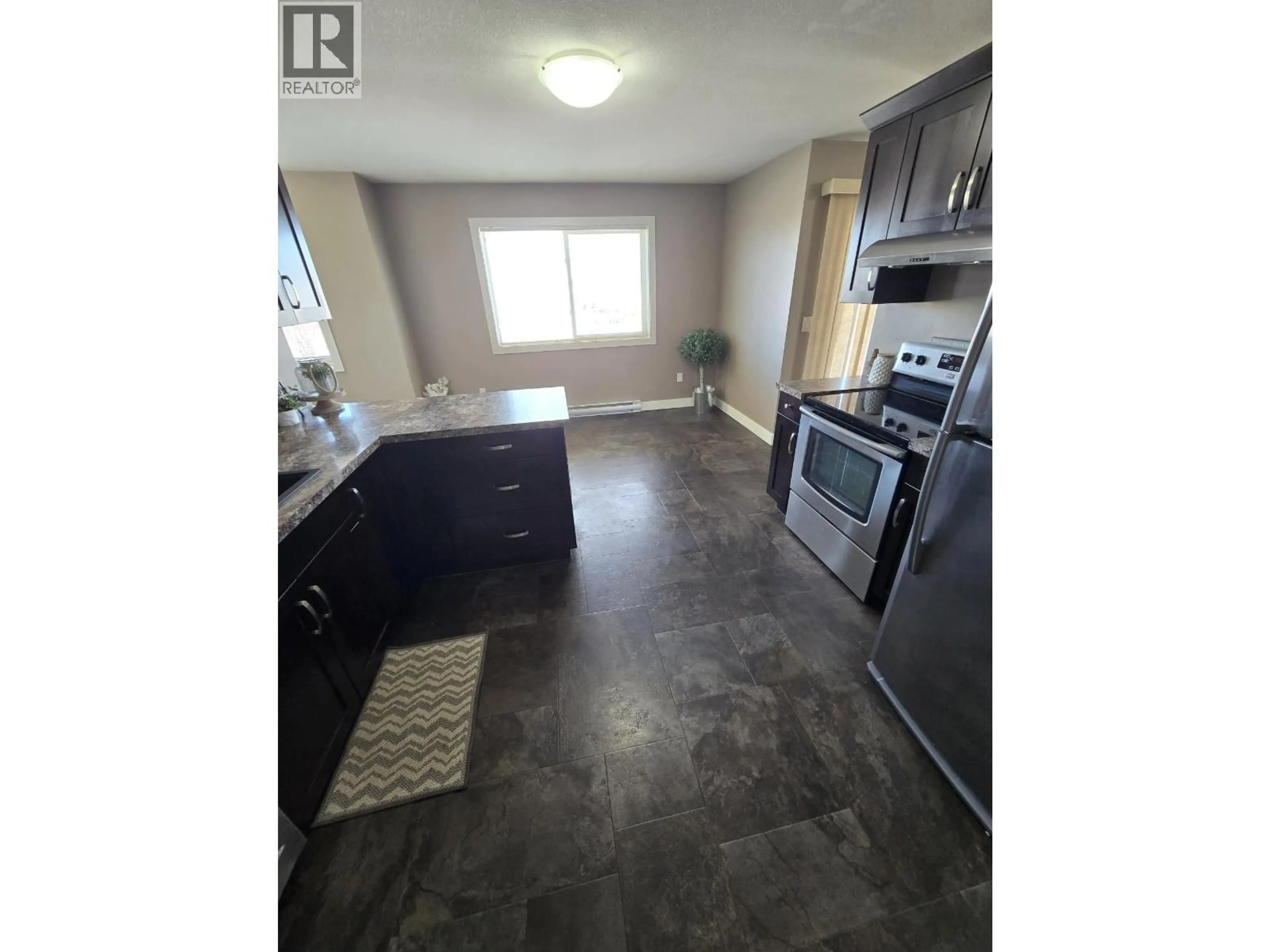Open concept kitchen, unknown for 2 - 10219 98 AVENUE, Fort St. John British Columbia V1J0B1