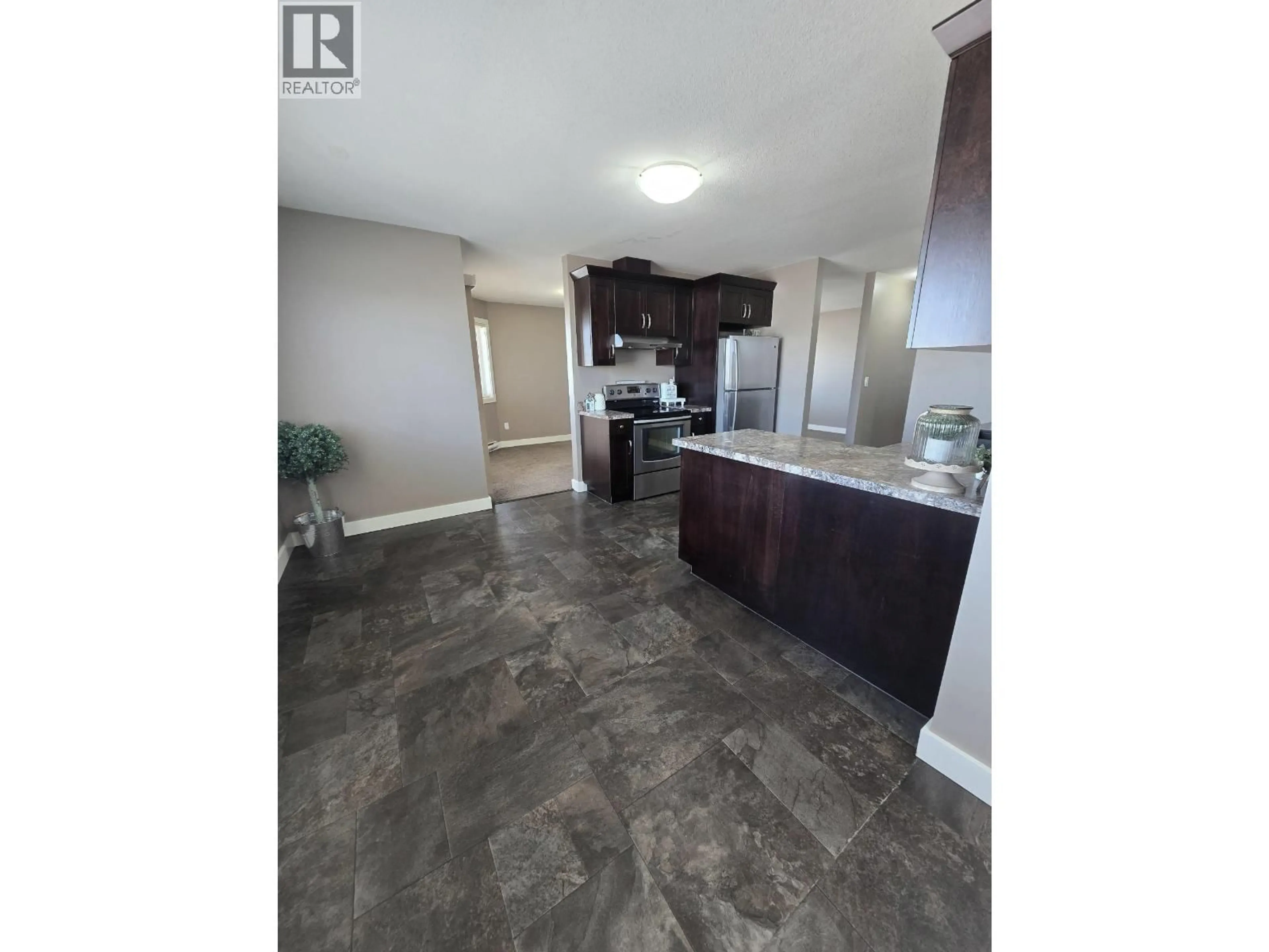 Open concept kitchen, unknown for 2 - 10219 98 AVENUE, Fort St. John British Columbia V1J0B1