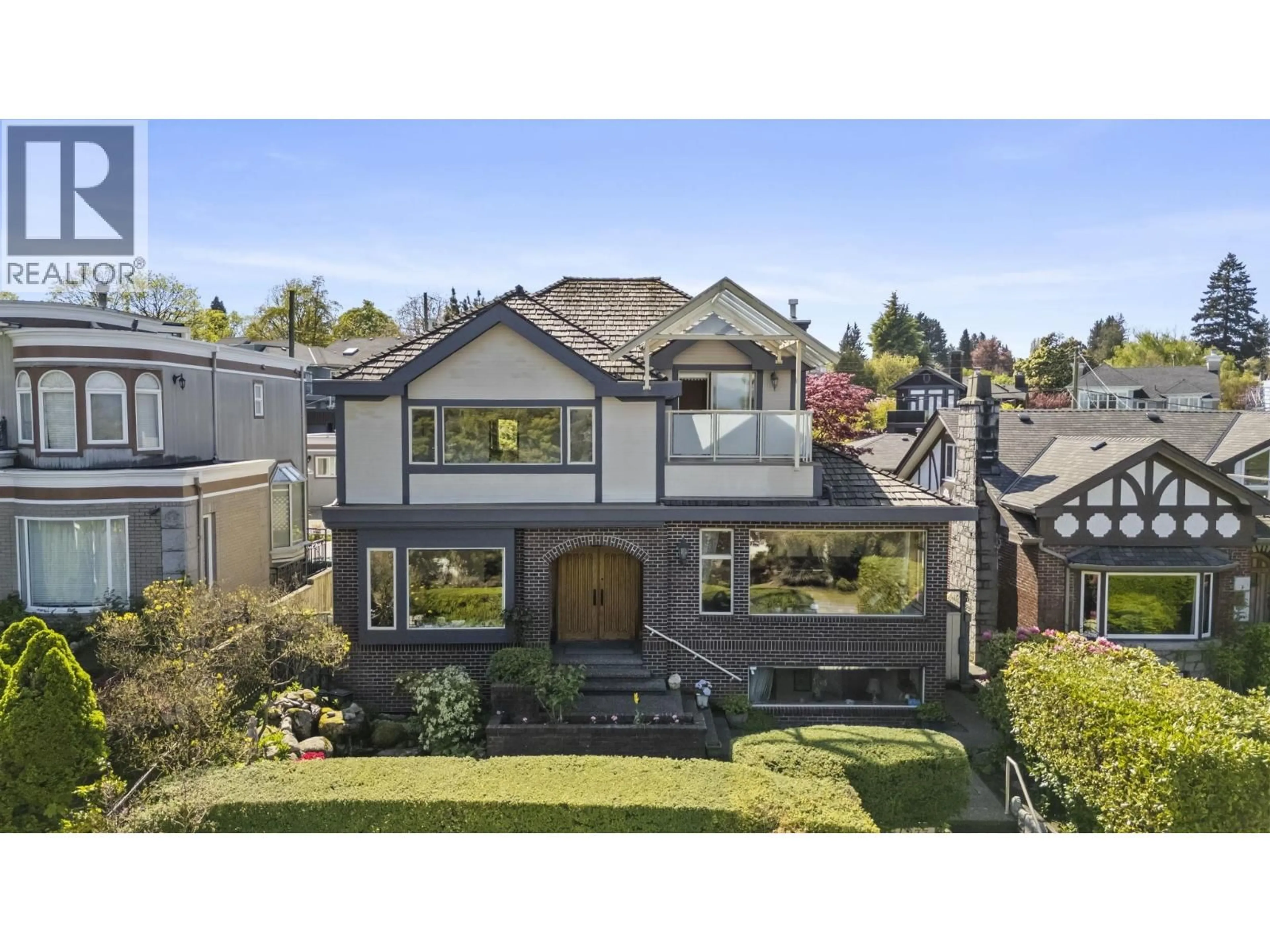 Home with brick exterior material, street for 4233 QUESNEL DRIVE, Vancouver British Columbia V6L2X5