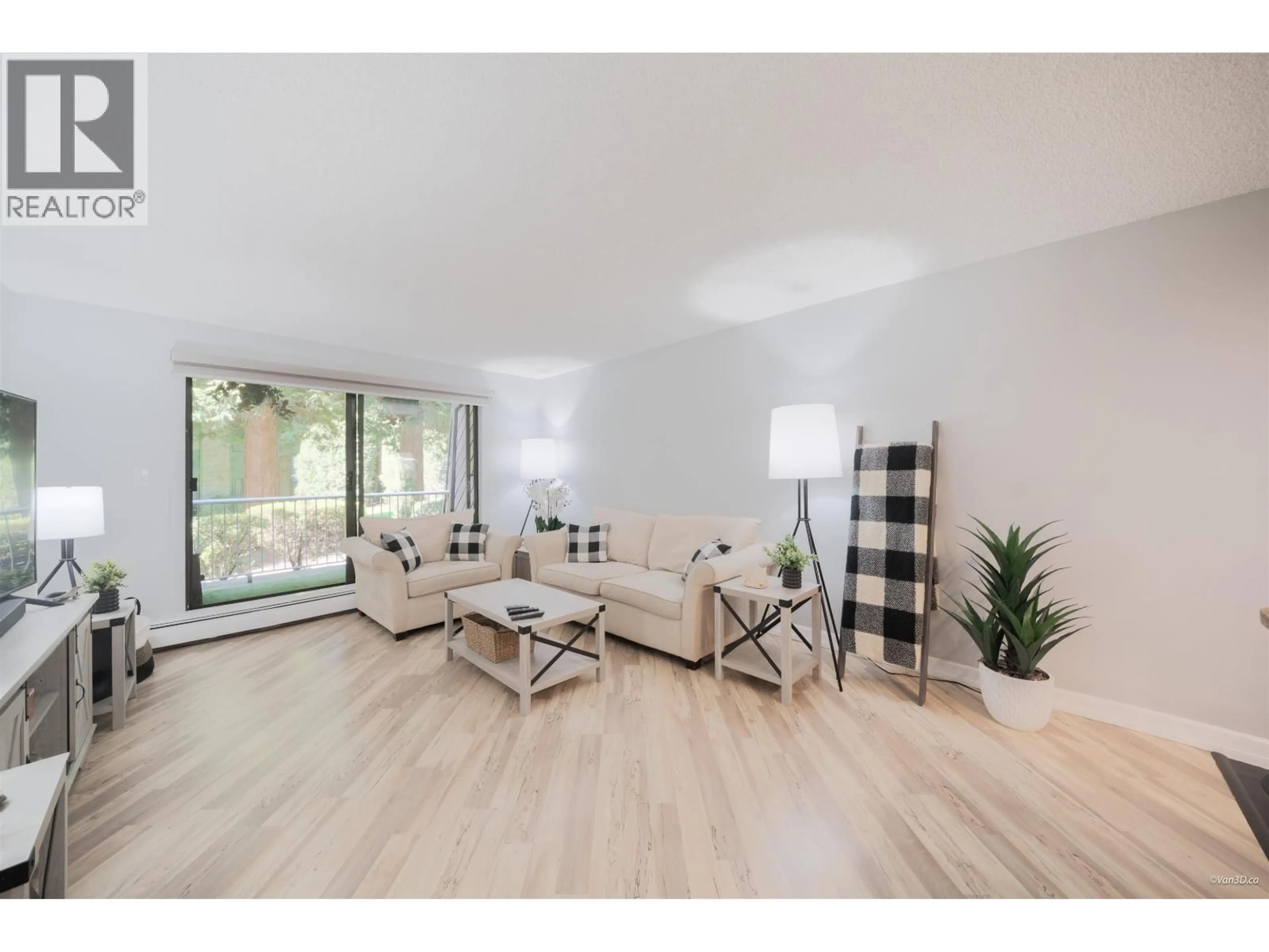 Living room with furniture, wood/laminate floor for 107 - 3911 CARRIGAN CRESCENT, Burnaby British Columbia V3N4J7