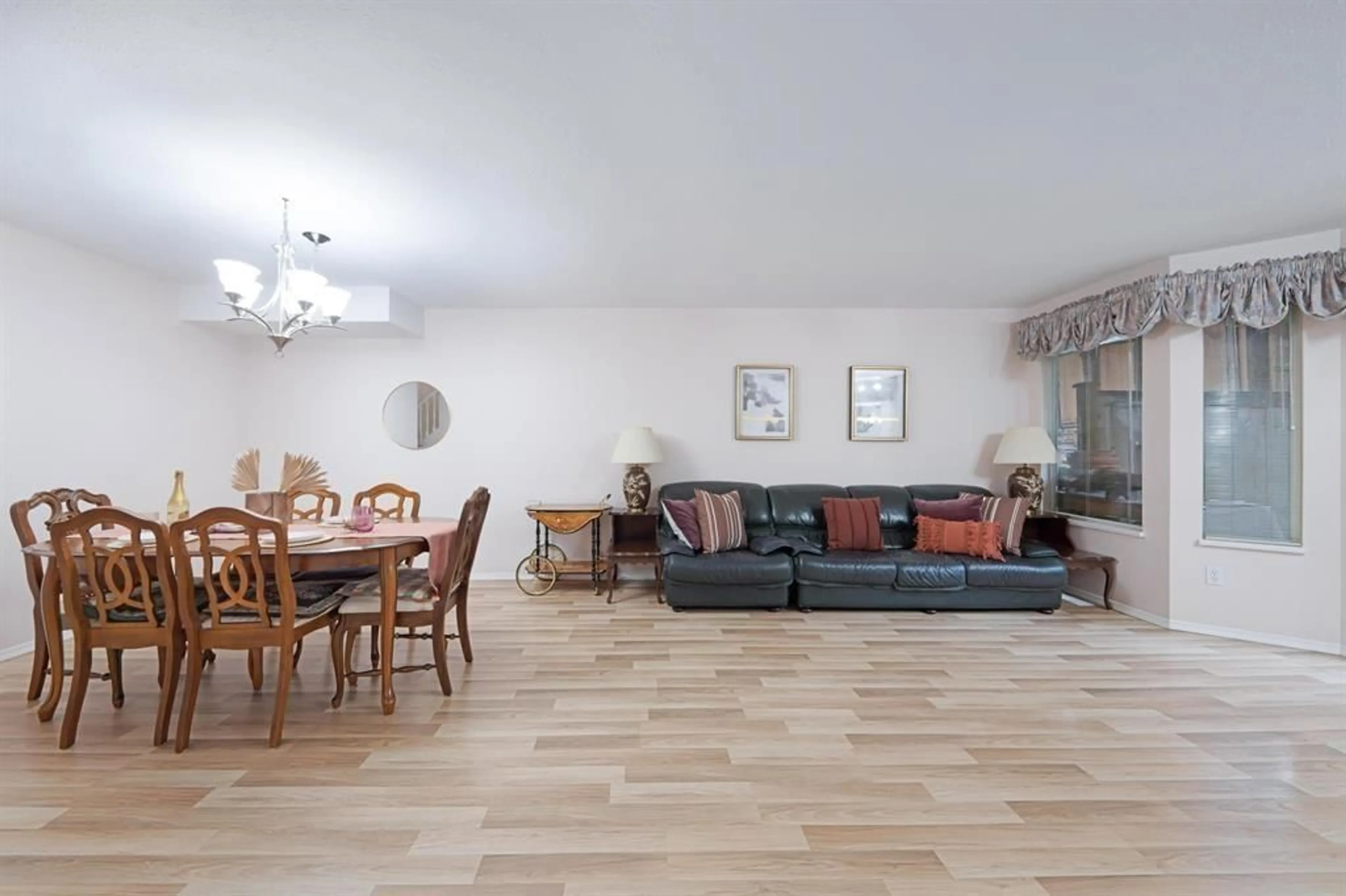 Living room with furniture, wood/laminate floor for 416 - 6866 NICHOLSON ROAD, Delta British Columbia V4E3M6