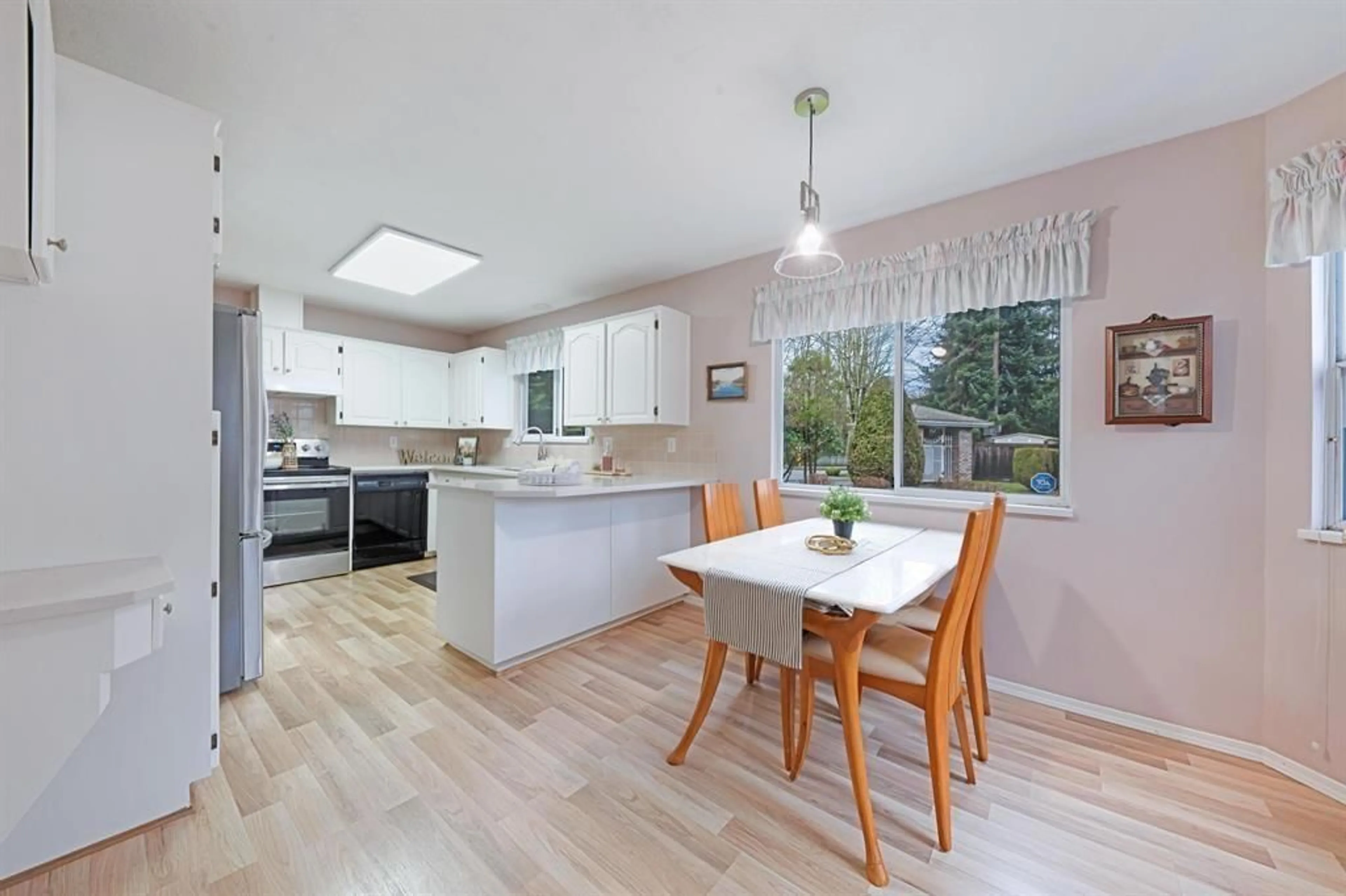 Open concept kitchen, wood/laminate floor for 416 - 6866 NICHOLSON ROAD, Delta British Columbia V4E3M6