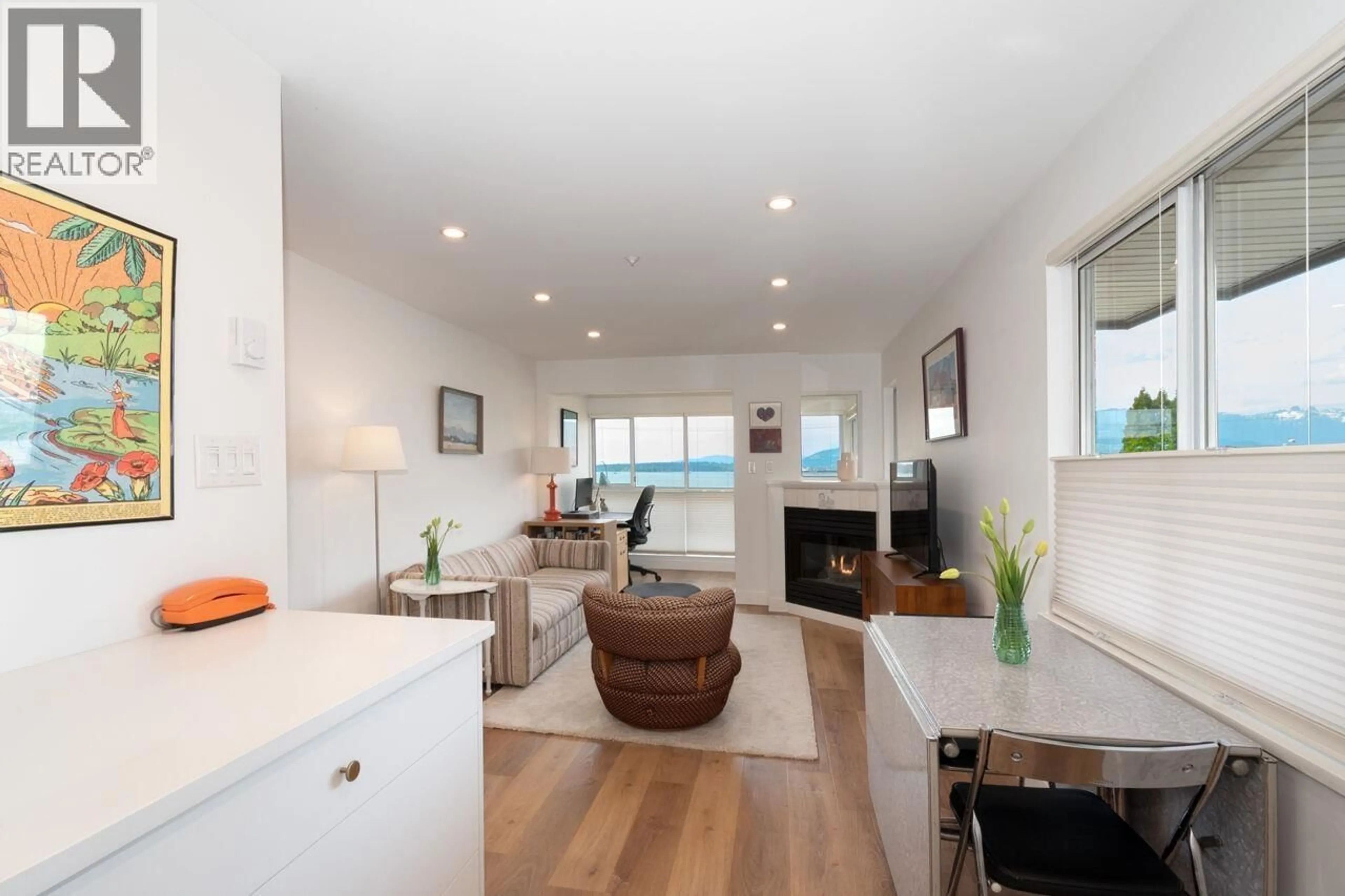 Living room with furniture, wood/laminate floor for 208 - 2211 WALL STREET, Vancouver British Columbia V5L1G4