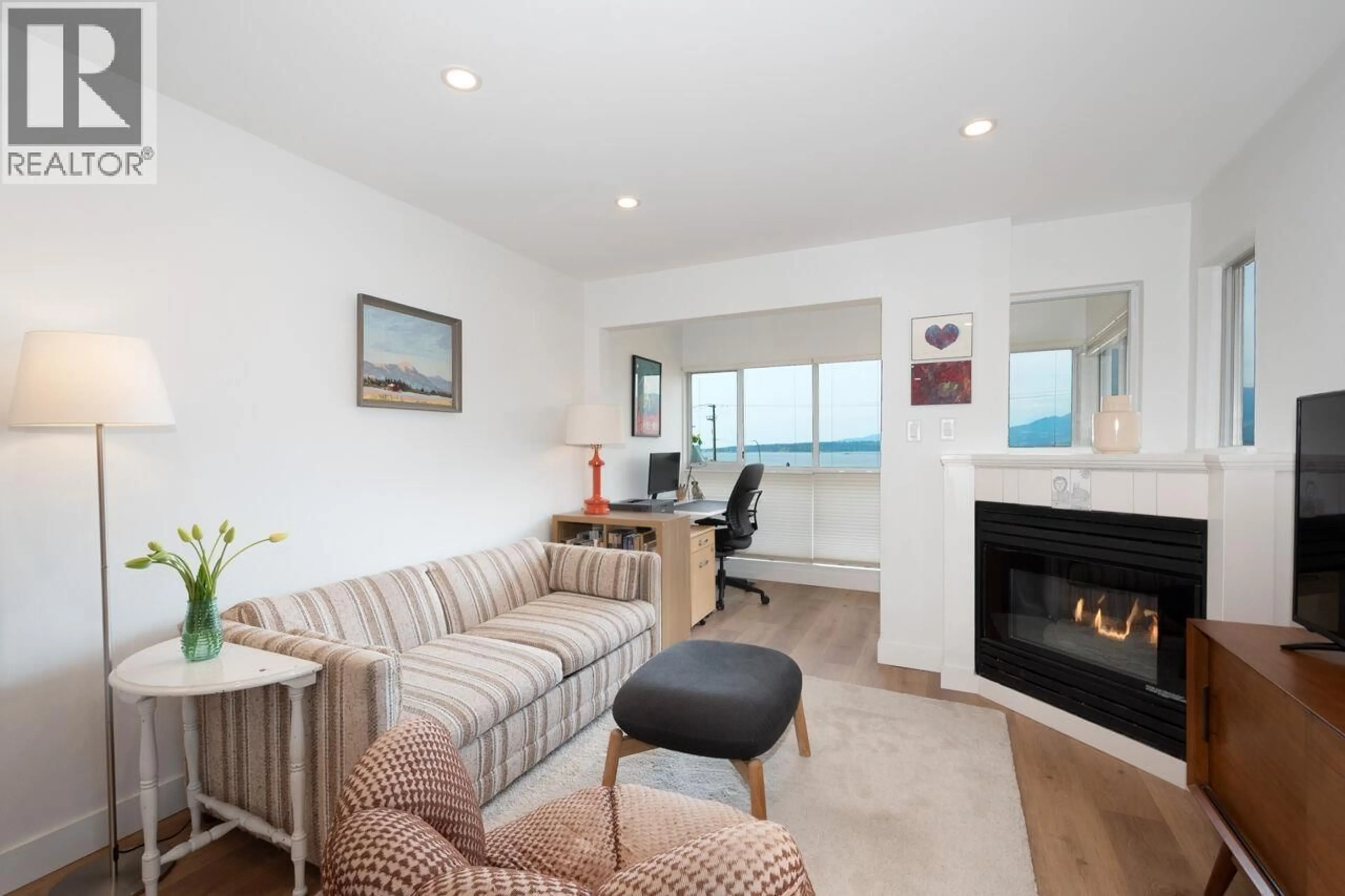 Living room with furniture, wood/laminate floor for 208 - 2211 WALL STREET, Vancouver British Columbia V5L1G4