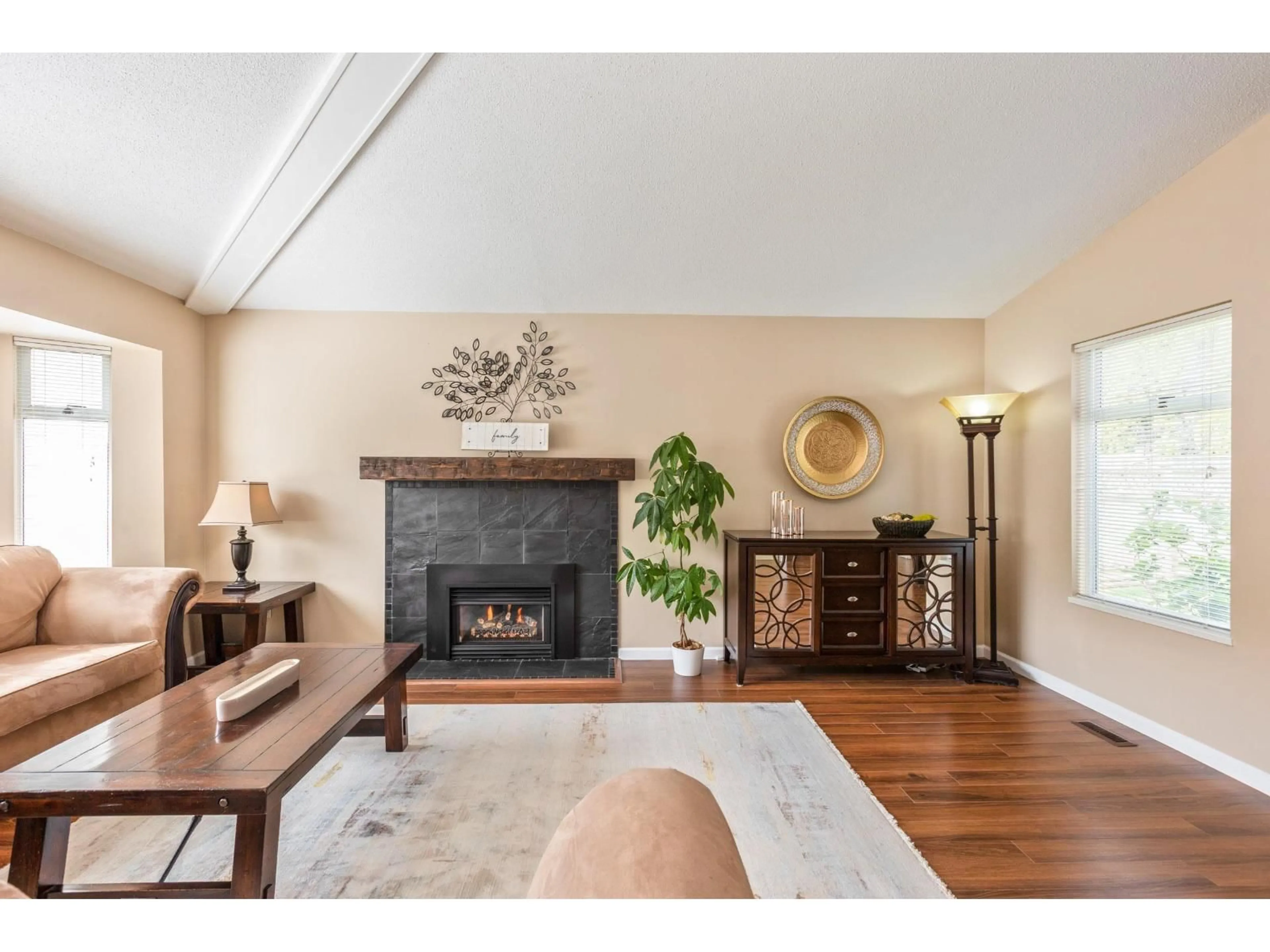 Living room with furniture, wood/laminate floor for 13855 65A AVENUE, Surrey British Columbia V3W8W1