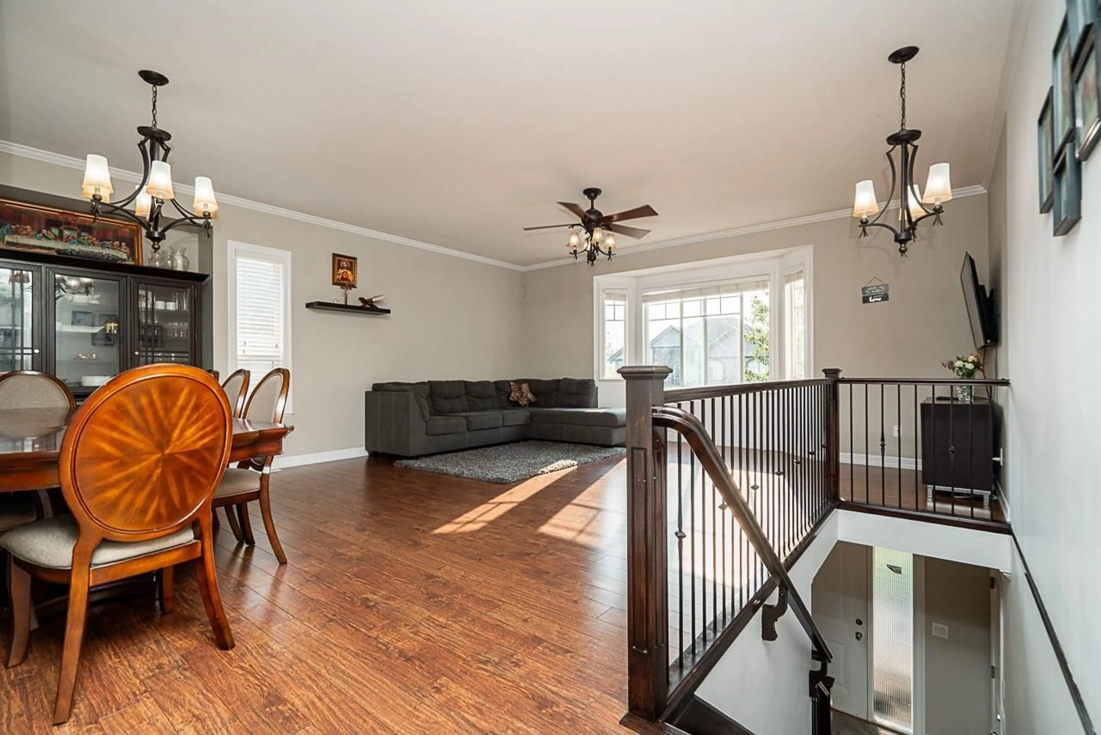 Living room with furniture, wood/laminate floor for 27680 SIGNAL COURT, Abbotsford British Columbia V4X0A4