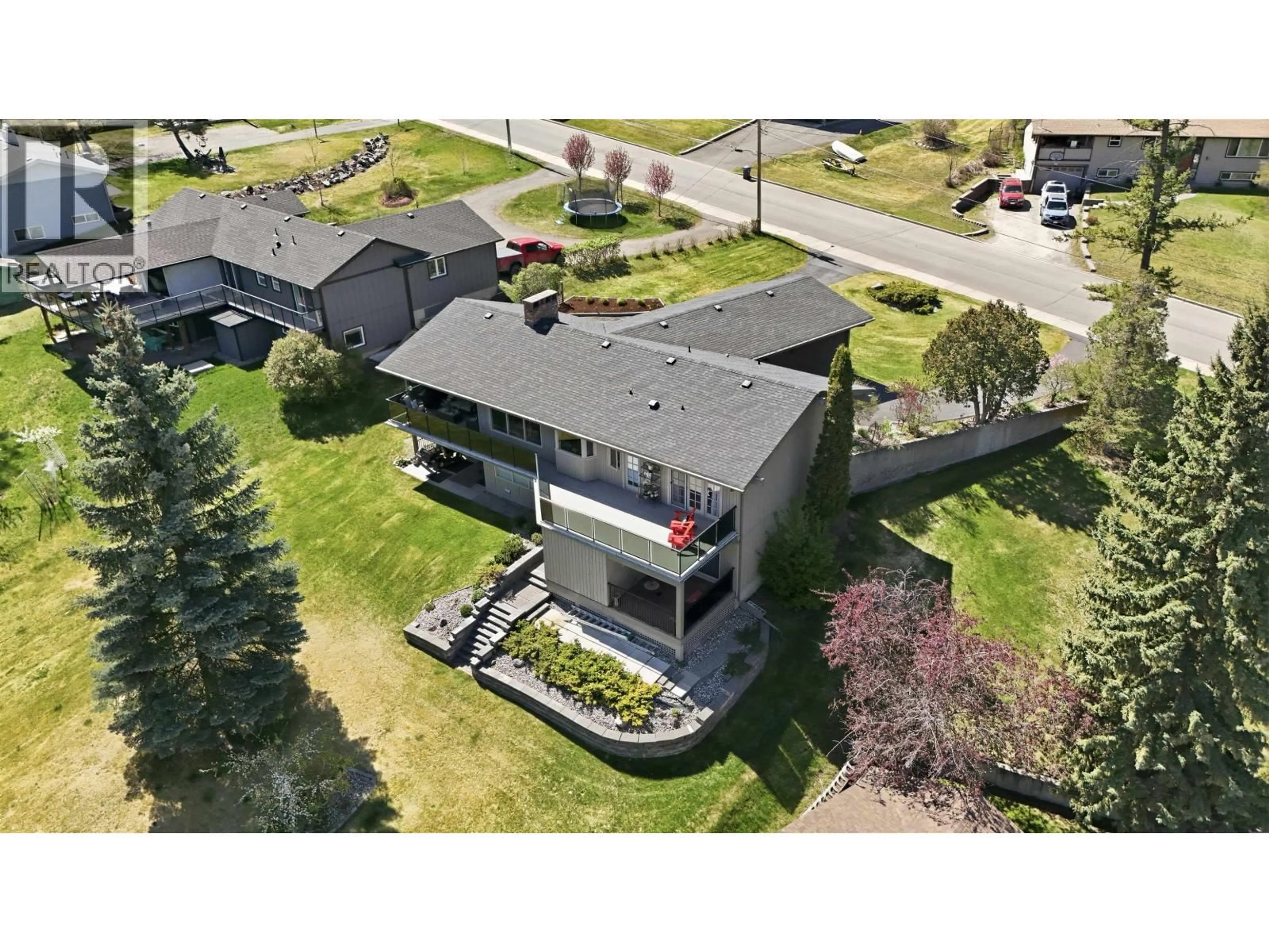 A pic from outside/outdoor area/front of a property/back of a property/a pic from drone, building for 130 COUNTRY CLUB BOULEVARD, Williams Lake British Columbia V2G3T2