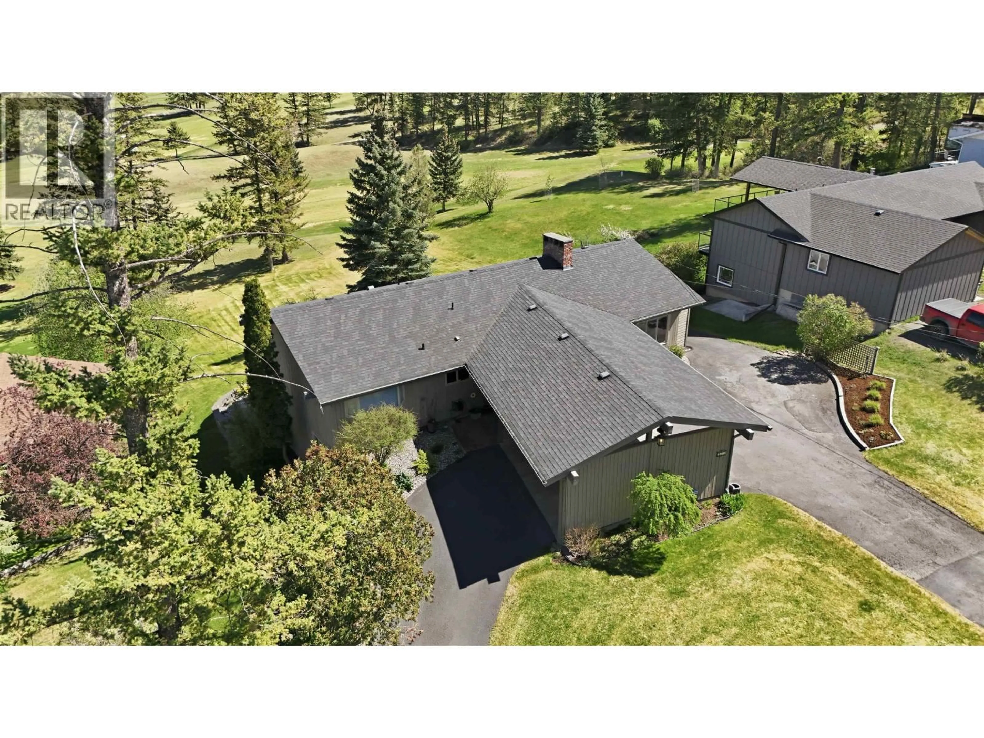 A pic from outside/outdoor area/front of a property/back of a property/a pic from drone, mountain view for 130 COUNTRY CLUB BOULEVARD, Williams Lake British Columbia V2G3T2
