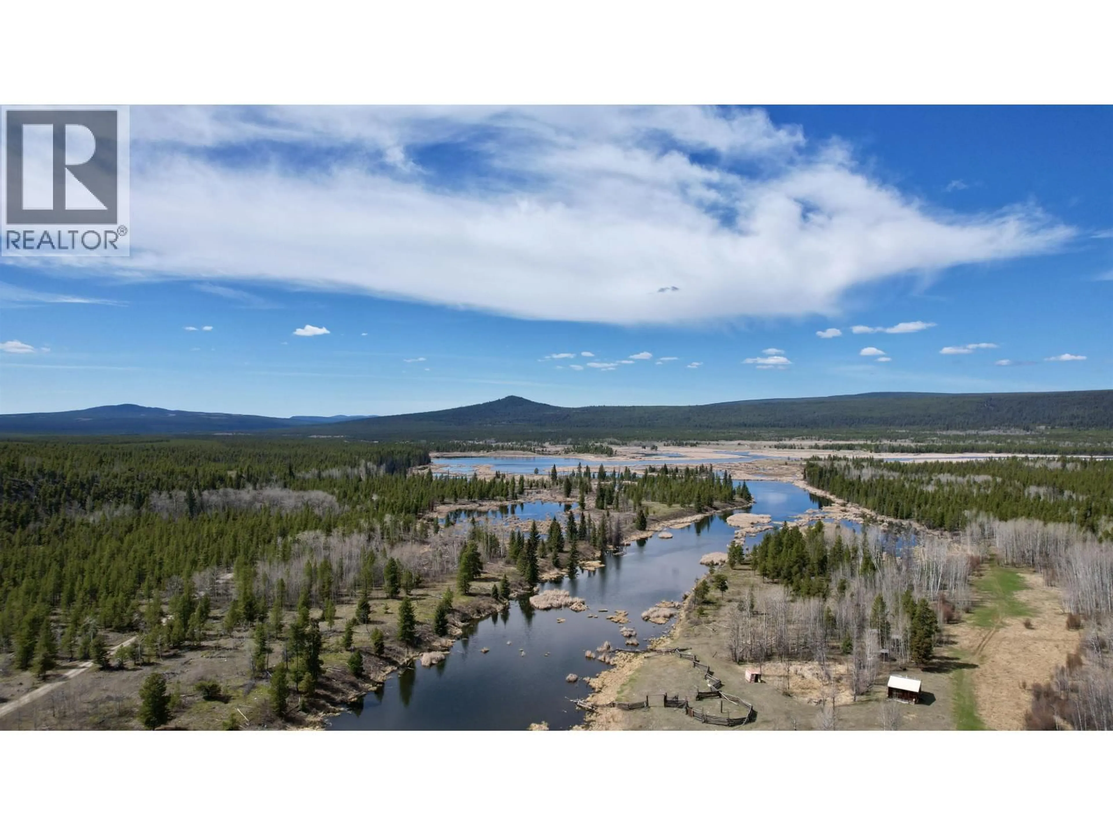A pic from outside/outdoor area/front of a property/back of a property/a pic from drone, water/lake/river/ocean view for 2428 CHILANKO LOOP ROAD, Williams Lake British Columbia V0L1V0