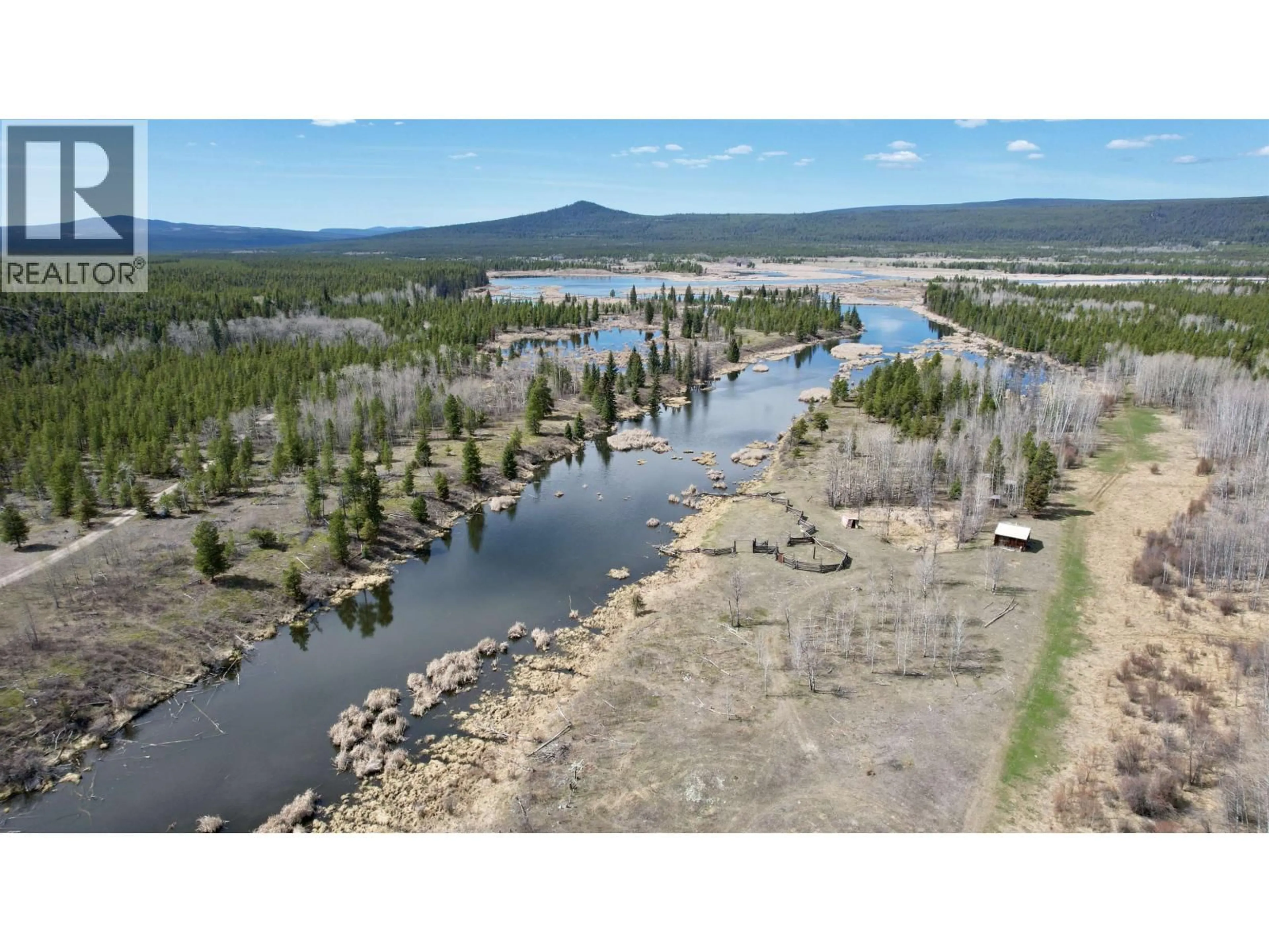 A pic from outside/outdoor area/front of a property/back of a property/a pic from drone, water/lake/river/ocean view for 2428 CHILANKO LOOP ROAD, Williams Lake British Columbia V0L1V0
