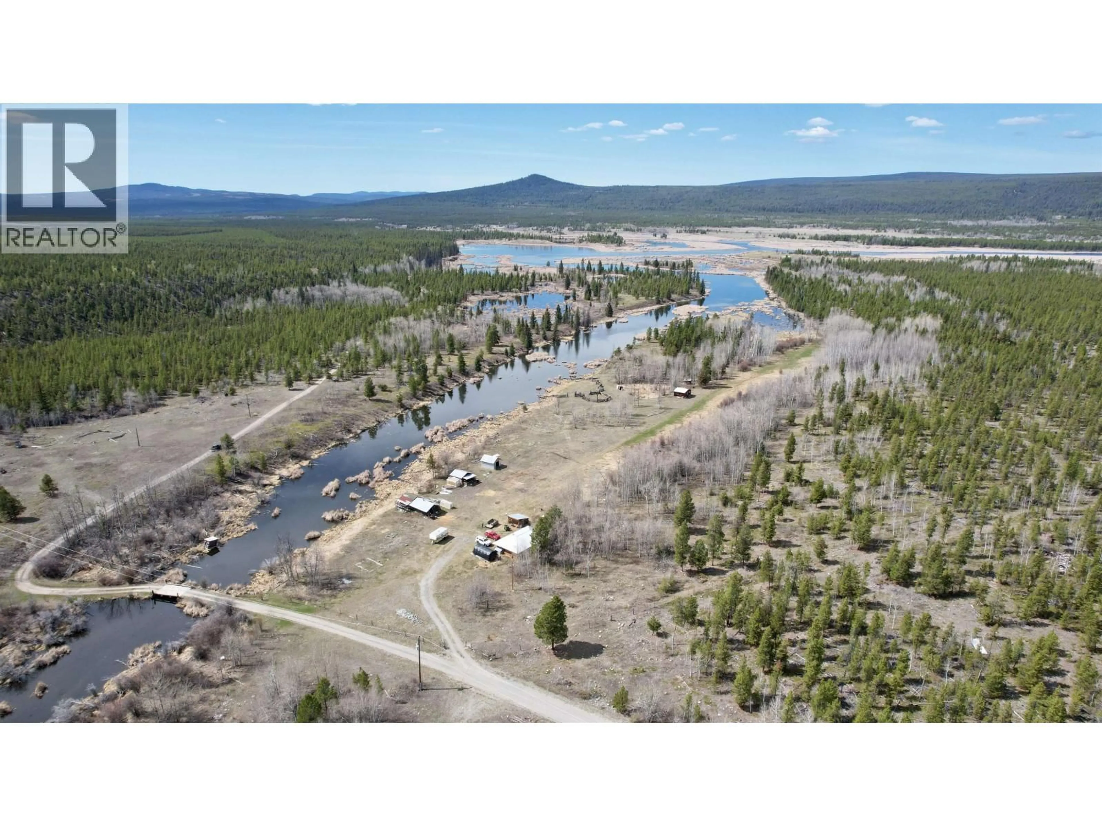 A pic from outside/outdoor area/front of a property/back of a property/a pic from drone, water/lake/river/ocean view for 2428 CHILANKO LOOP ROAD, Williams Lake British Columbia V0L1V0