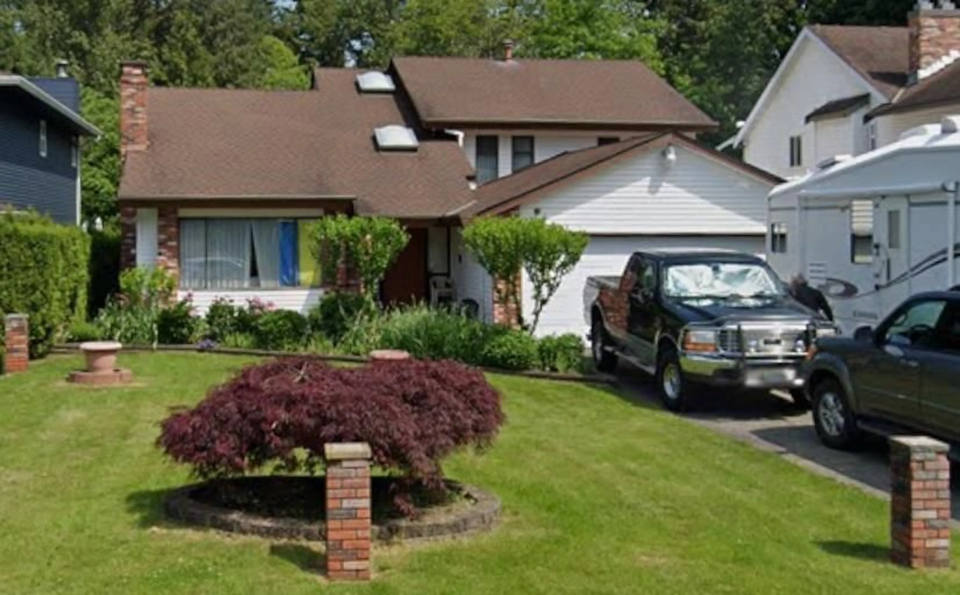 Home with vinyl exterior material, street for 20519 TELEGRAPH TRAIL, Langley British Columbia V1M1A7