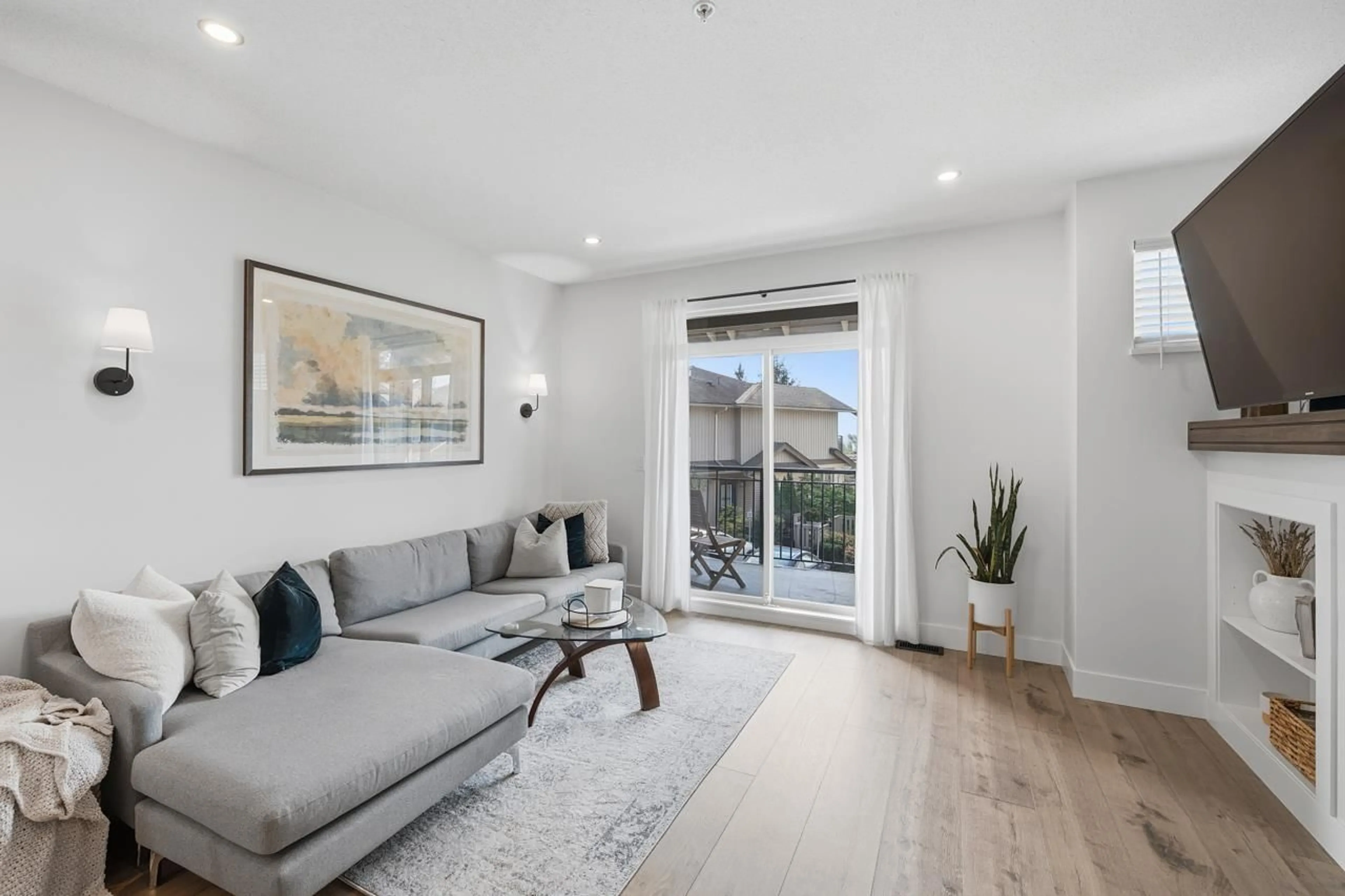 Living room with furniture, wood/laminate floor for 46 - 20326 68TH AVENUE, Langley British Columbia V2Y0E3