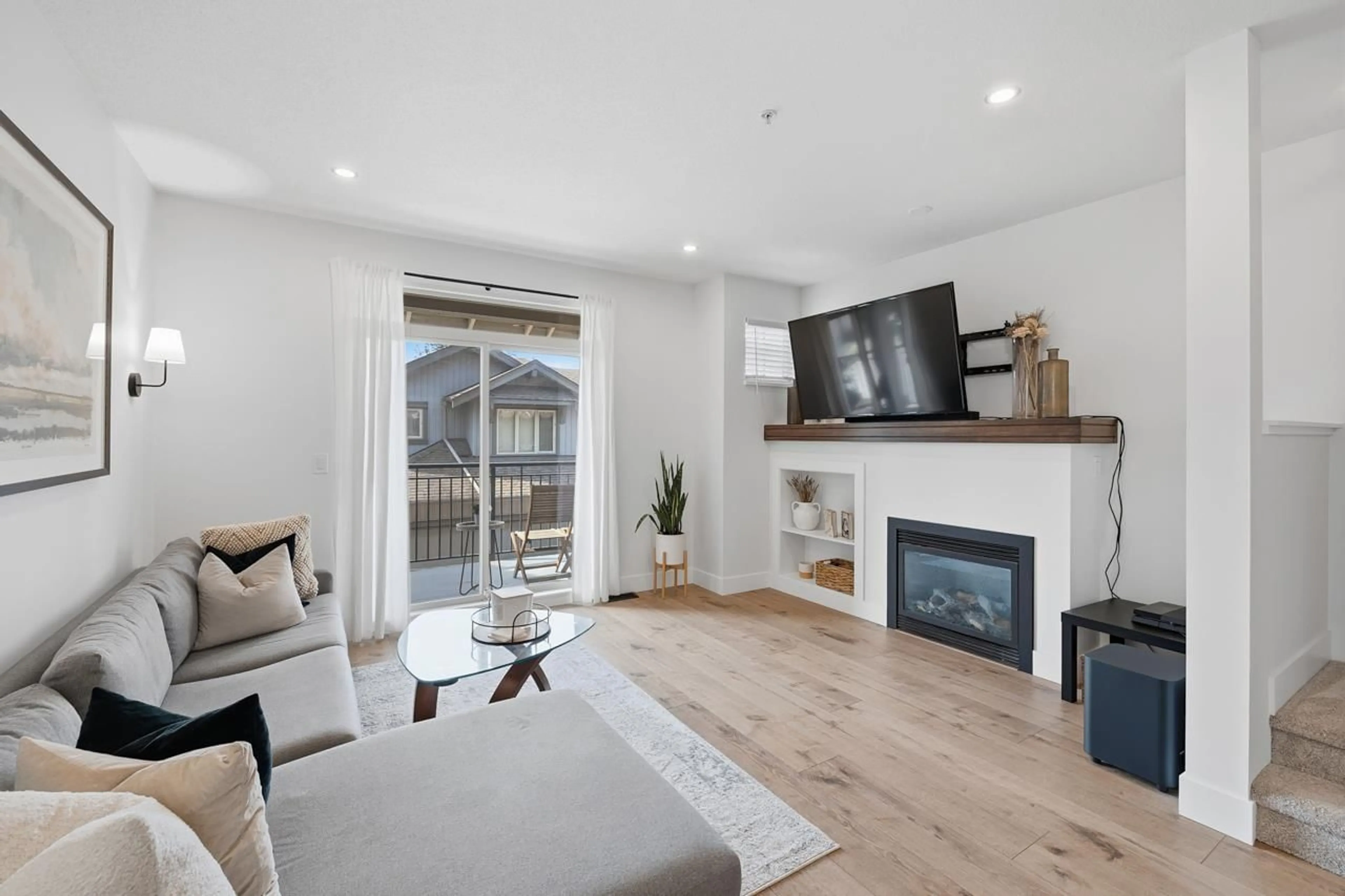 Living room with furniture, wood/laminate floor for 46 - 20326 68TH AVENUE, Langley British Columbia V2Y0E3