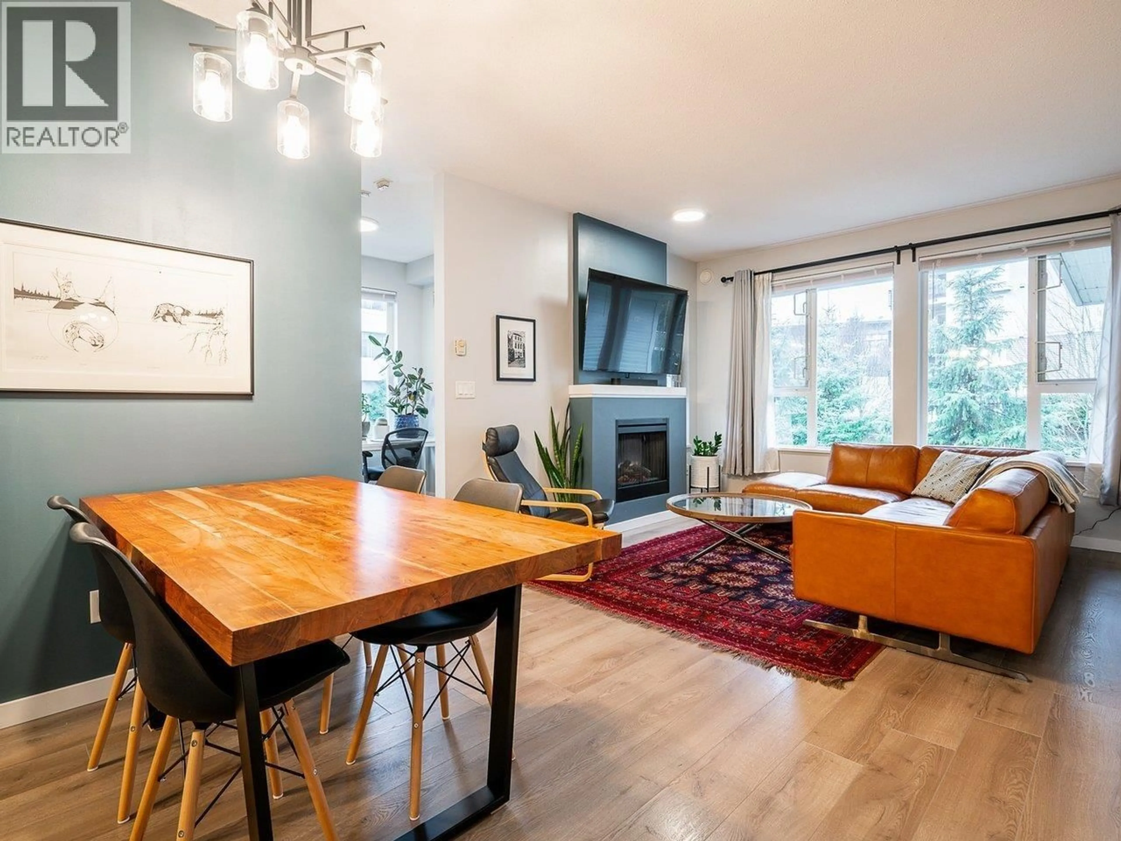 Living room with furniture, wood/laminate floor for 412 - 4723 DAWSON STREET, Burnaby British Columbia V5C0A7
