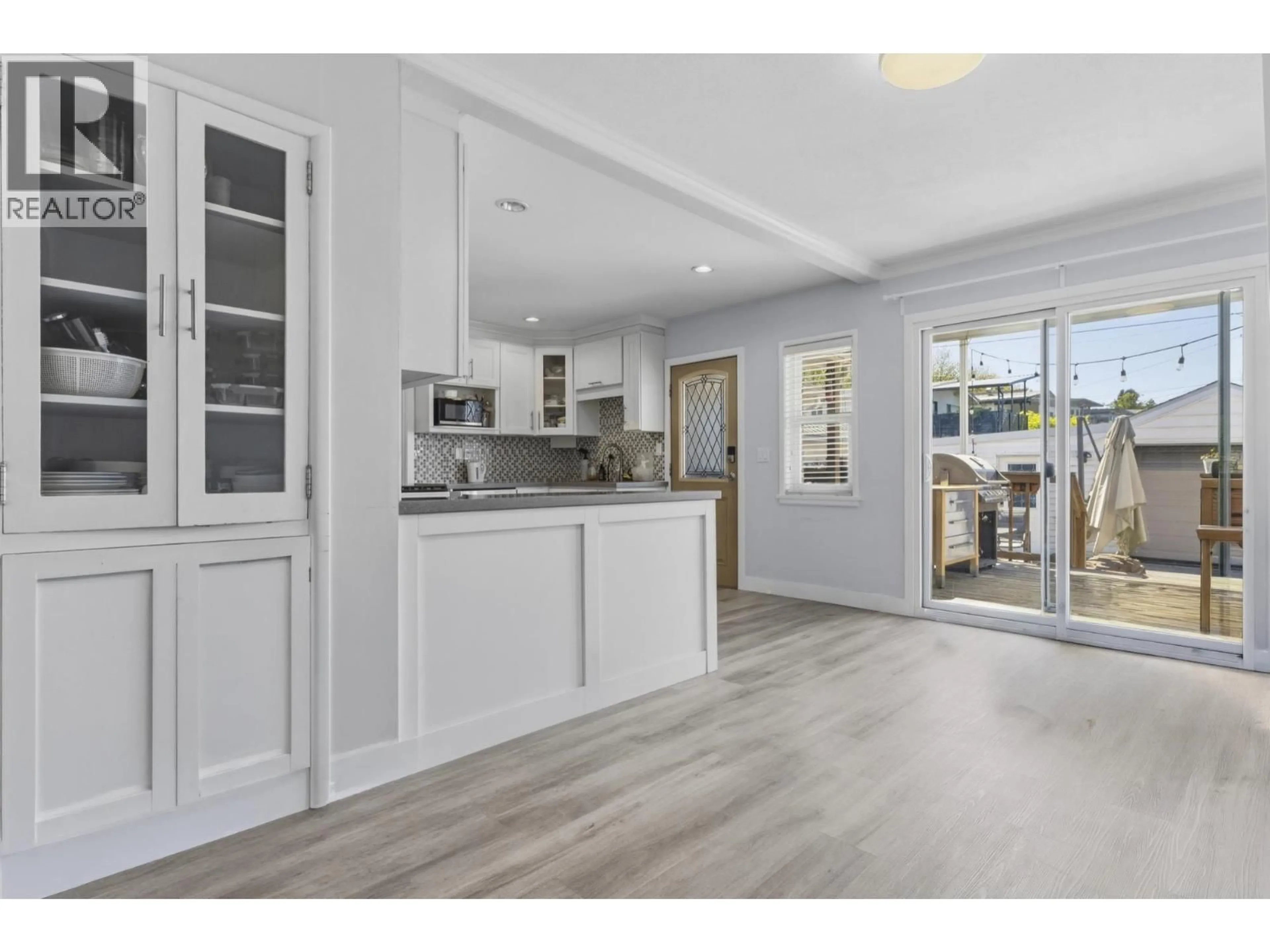 Open concept kitchen, wood/laminate floor for 45 RENFREW STREET, Vancouver British Columbia V5K4A5
