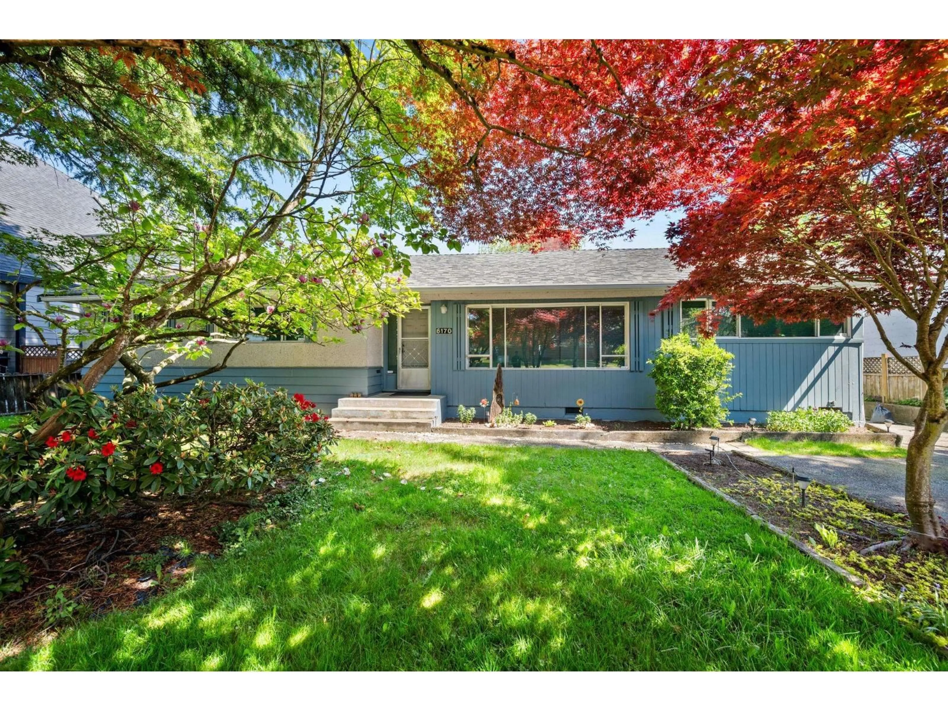 Home with vinyl exterior material, street for 6170 175A STREET, Surrey British Columbia V3S4B7