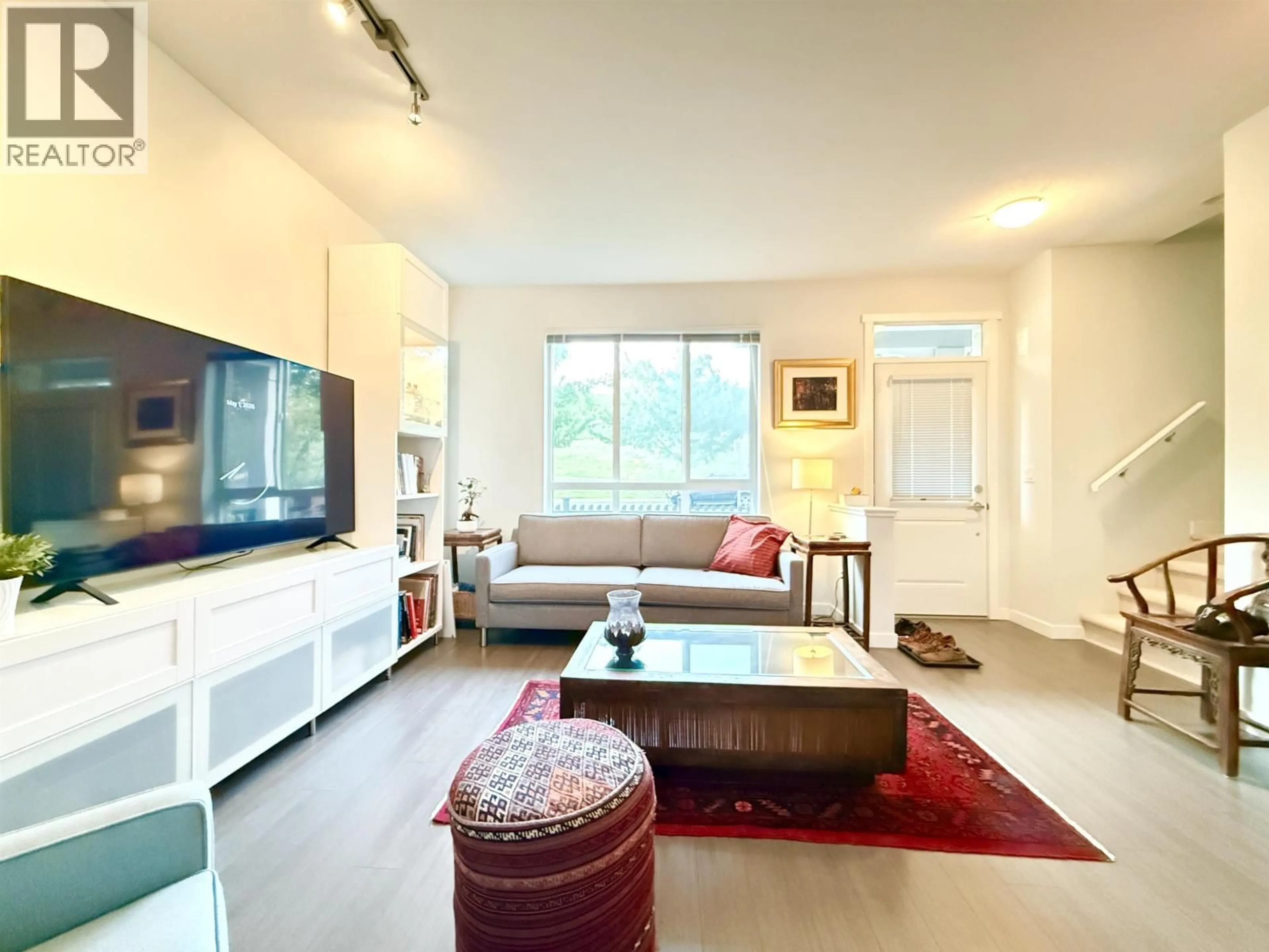 Living room with furniture, unknown for 18 - 3500 BURKE VILLAGE PROMENADE, Vancouver British Columbia V3E0N2
