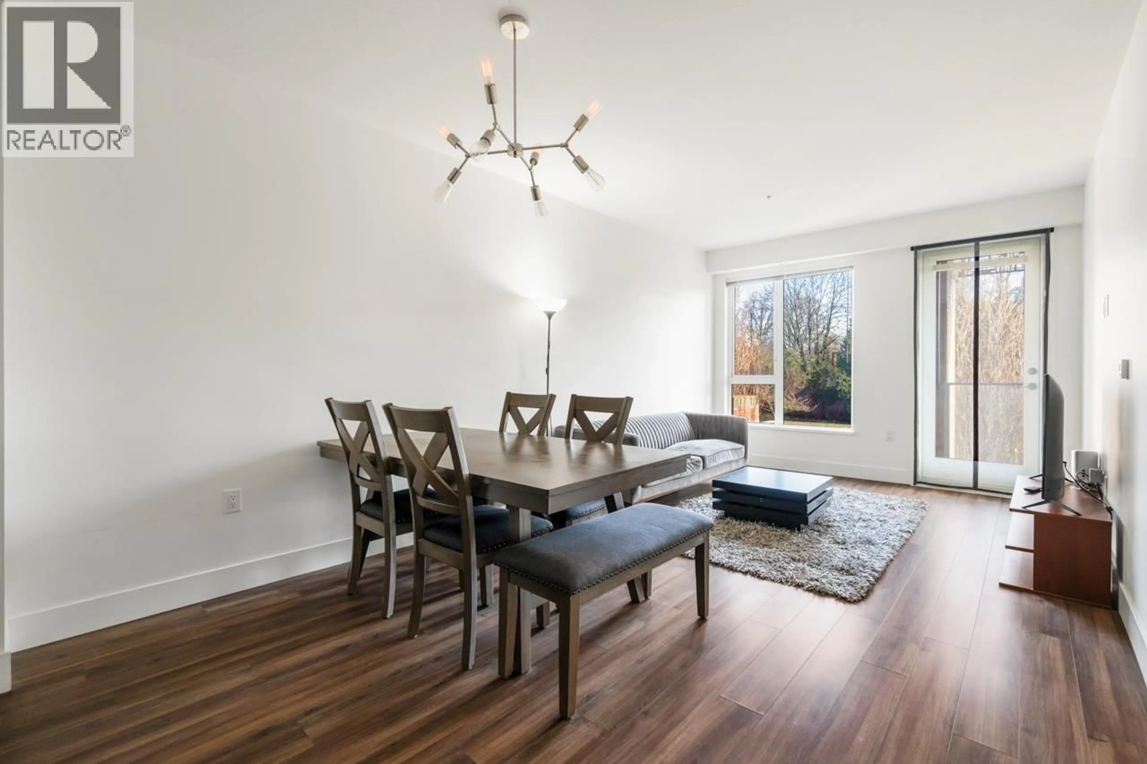 Dining room, wood/laminate floor for 205 - 6933 CAMBIE STREET, Vancouver British Columbia V6P0J1