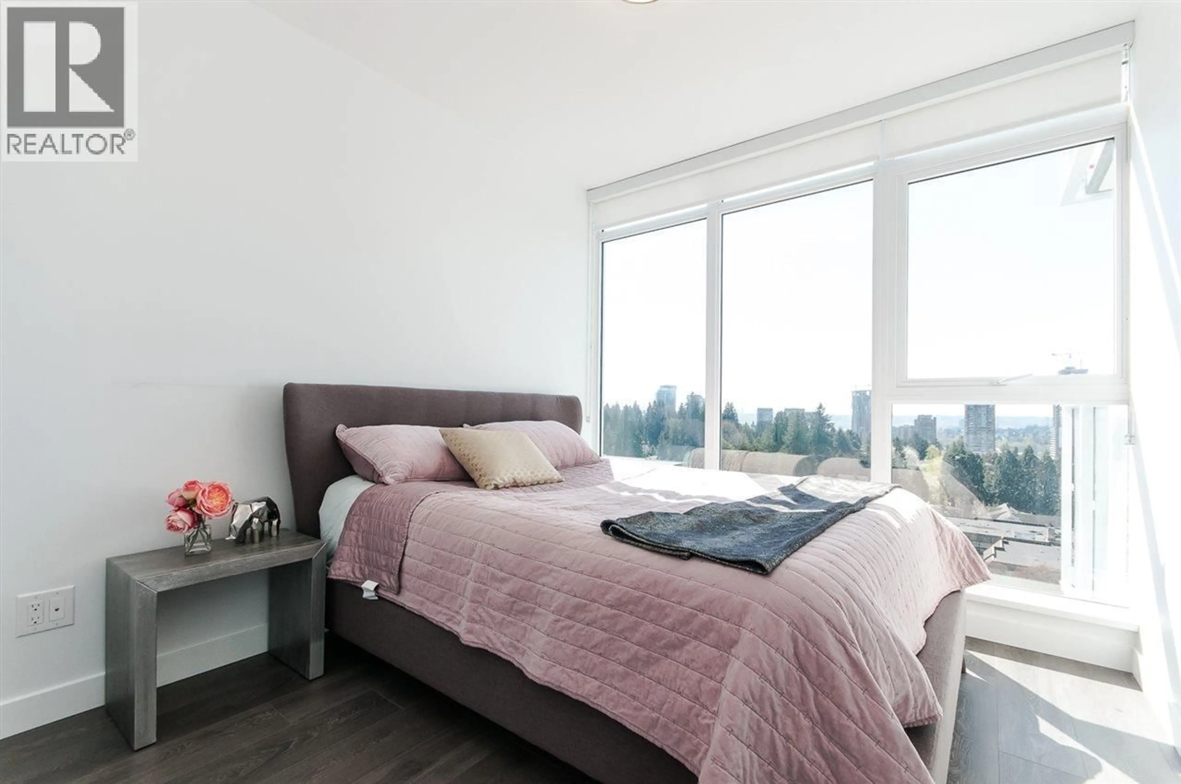 Bedroom with bed, wood/laminate floor for 1003 - 652 WHITING WAY, Coquitlam British Columbia V3J0K3