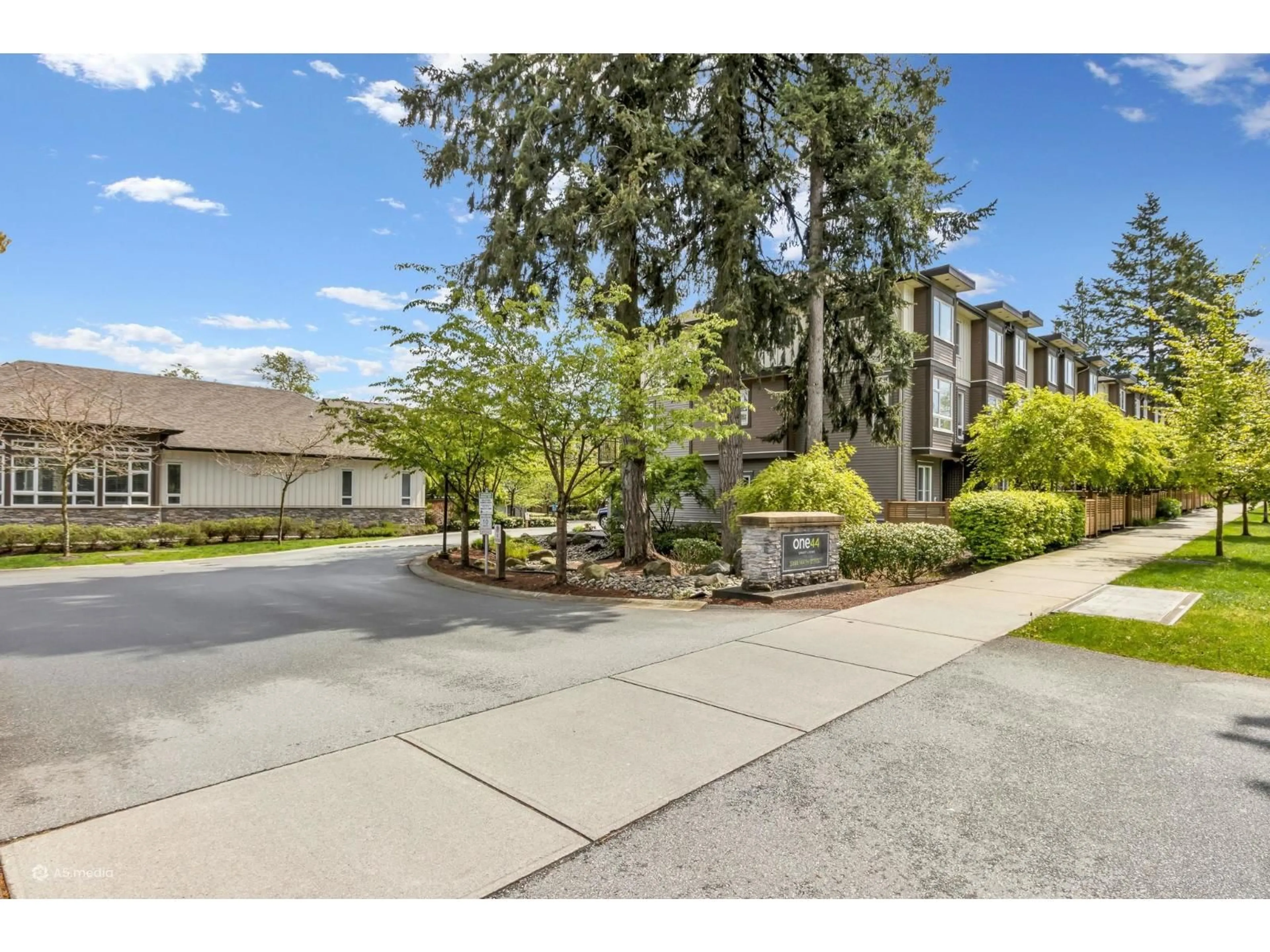 A pic from outside/outdoor area/front of a property/back of a property/a pic from drone, street for 115 - 5888 144 STREET, Surrey British Columbia V3Z0G8