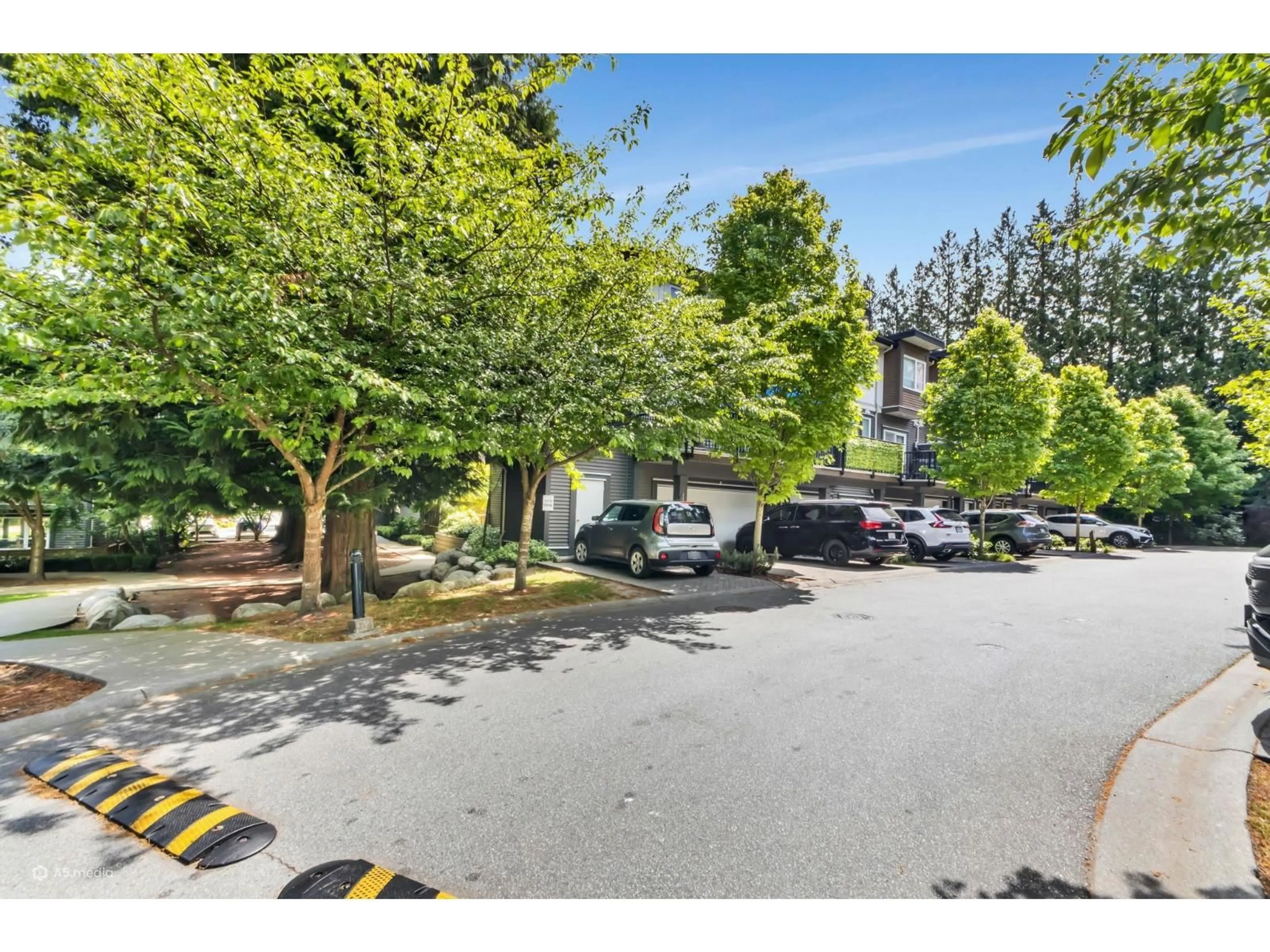 A pic from outside/outdoor area/front of a property/back of a property/a pic from drone, street for 115 - 5888 144 STREET, Surrey British Columbia V3Z0G8