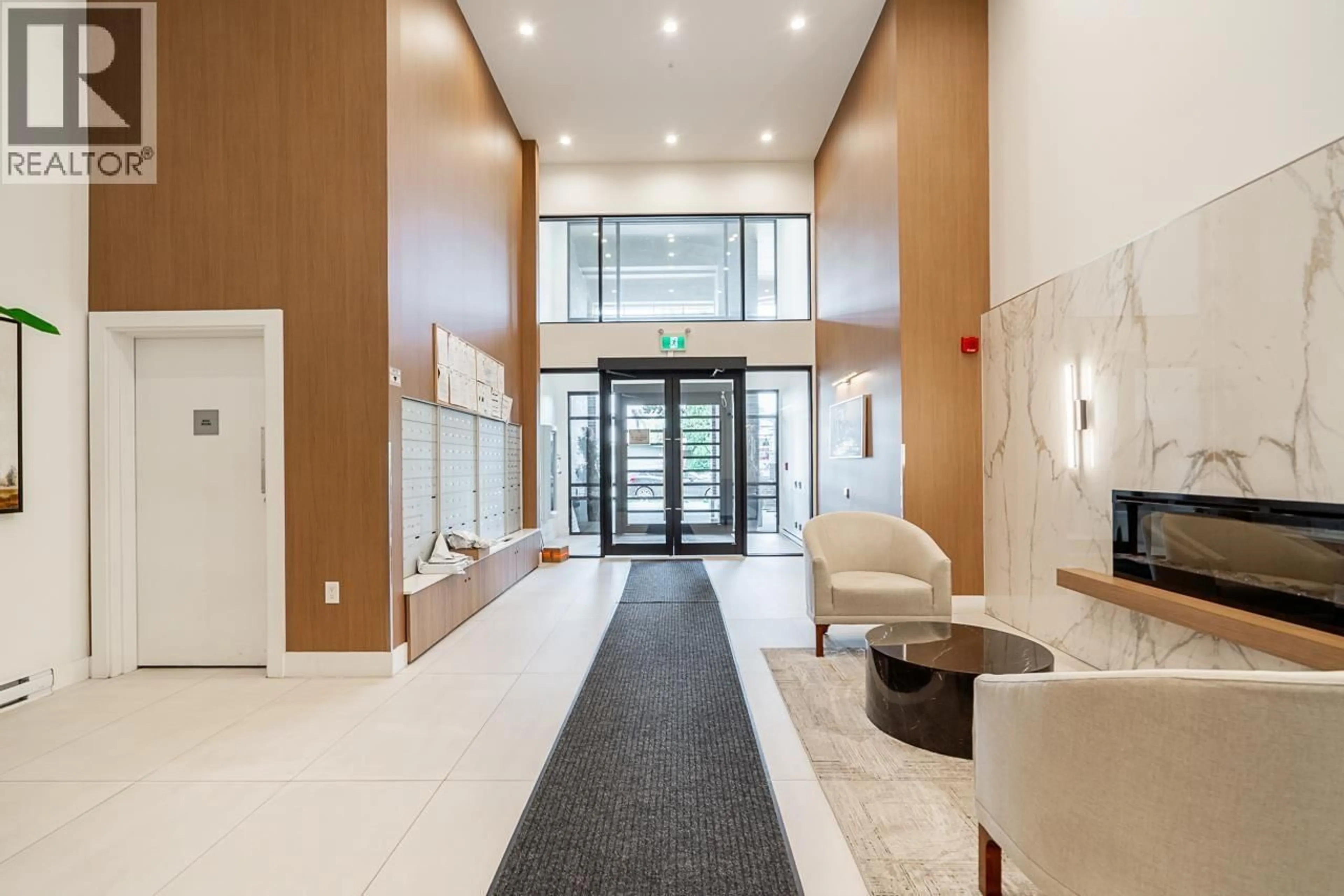 Indoor foyer for 207 - 7599 15TH STREET, Burnaby British Columbia V3N0H9