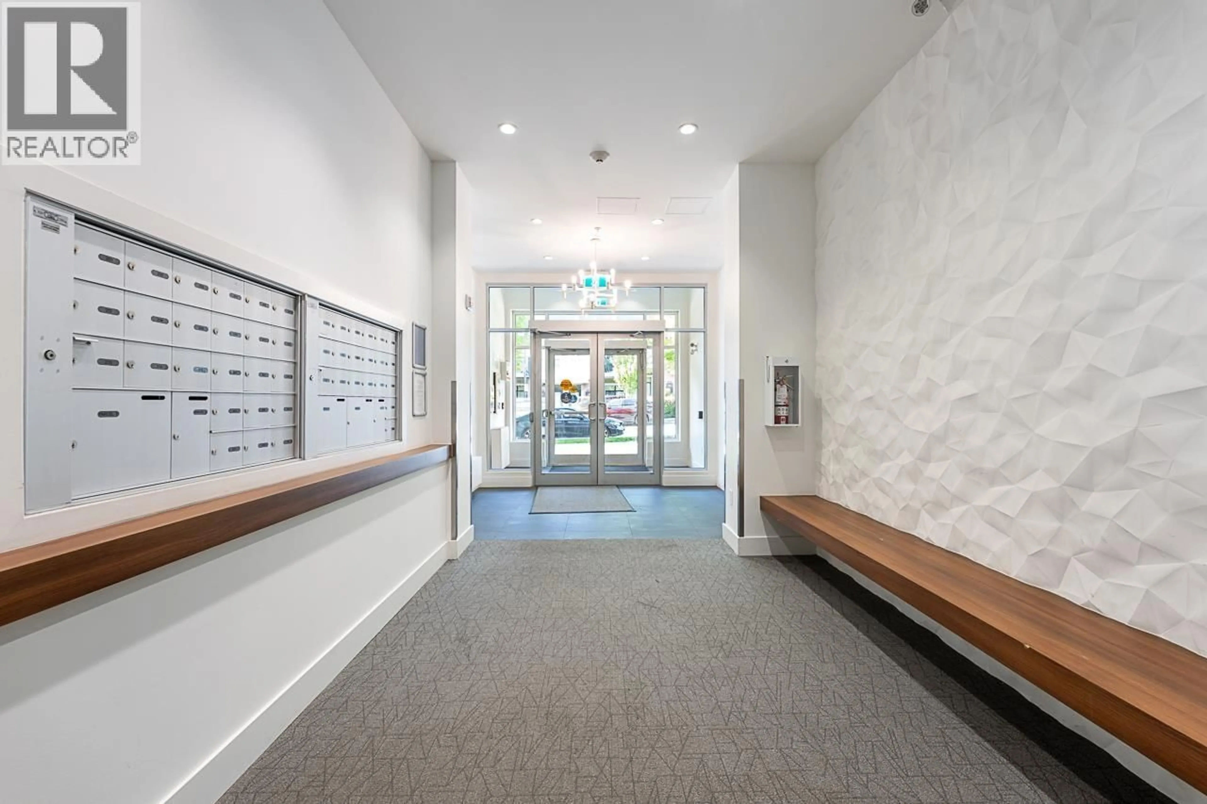 Indoor foyer for 204 - 711 14TH STREET, North Vancouver British Columbia V7M3E8