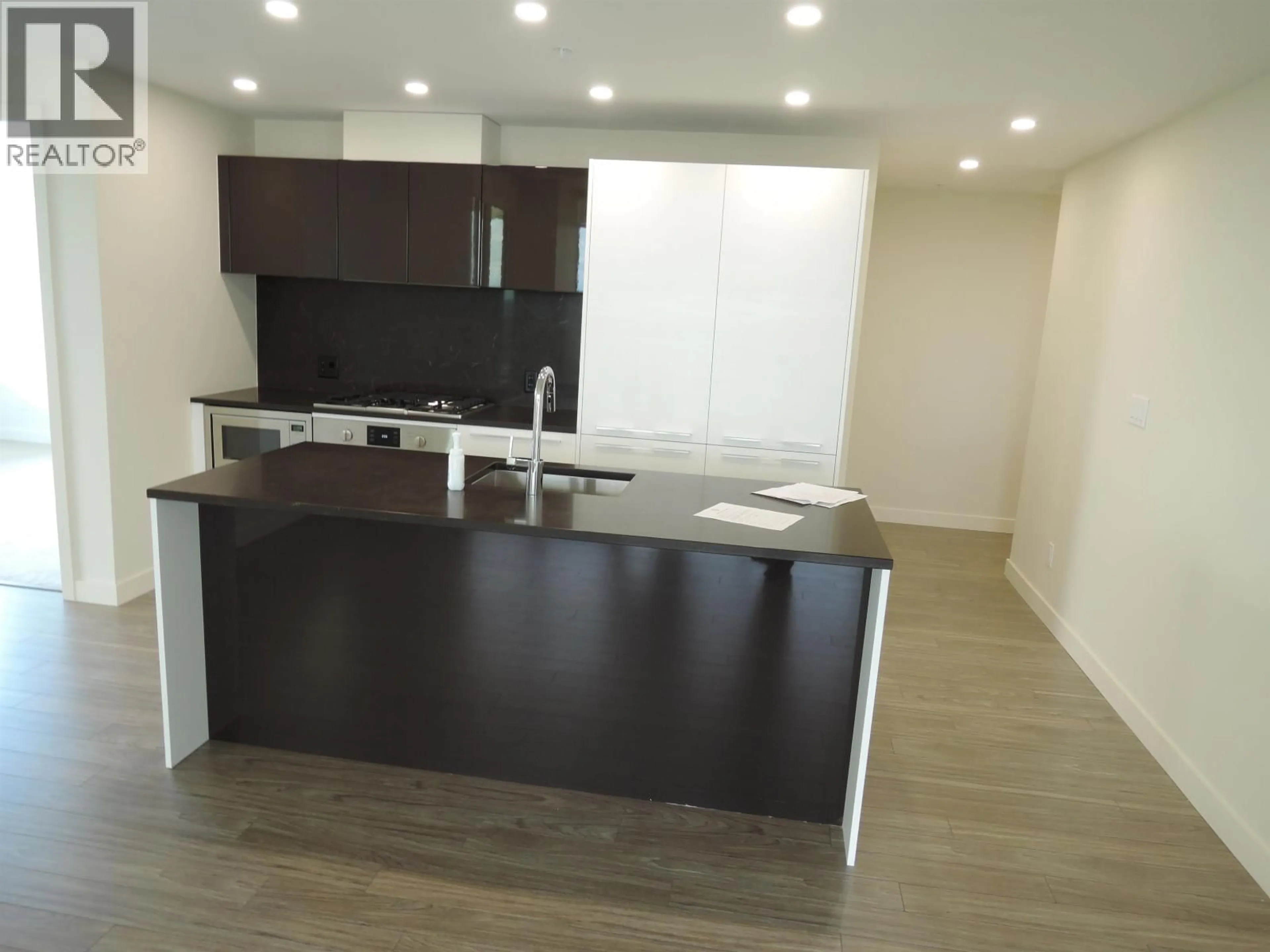 Open concept kitchen, wood/laminate floor for 1305 - 6288 CASSIE AVENUE, Burnaby British Columbia V5H0H7