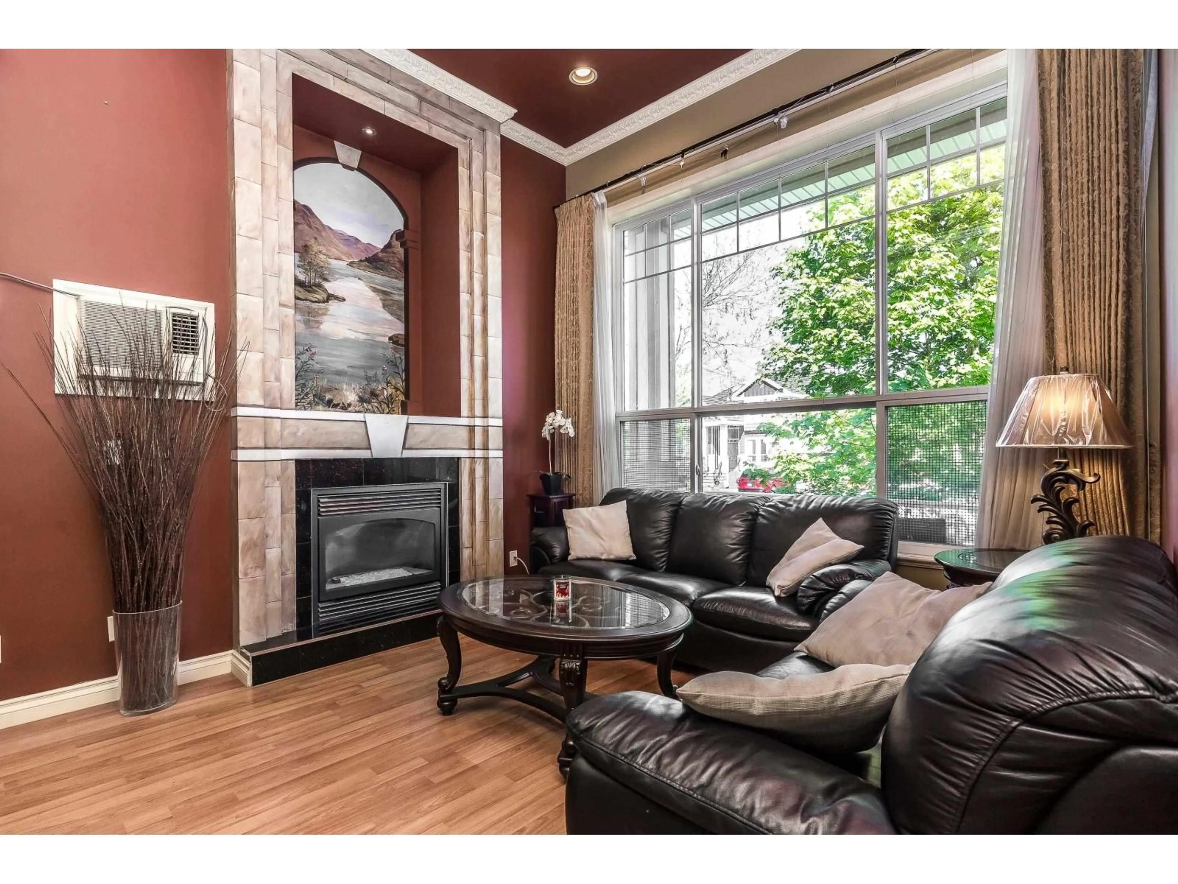 Living room with furniture, wood/laminate floor for 7625 151A STREET, Surrey British Columbia V3S5P1