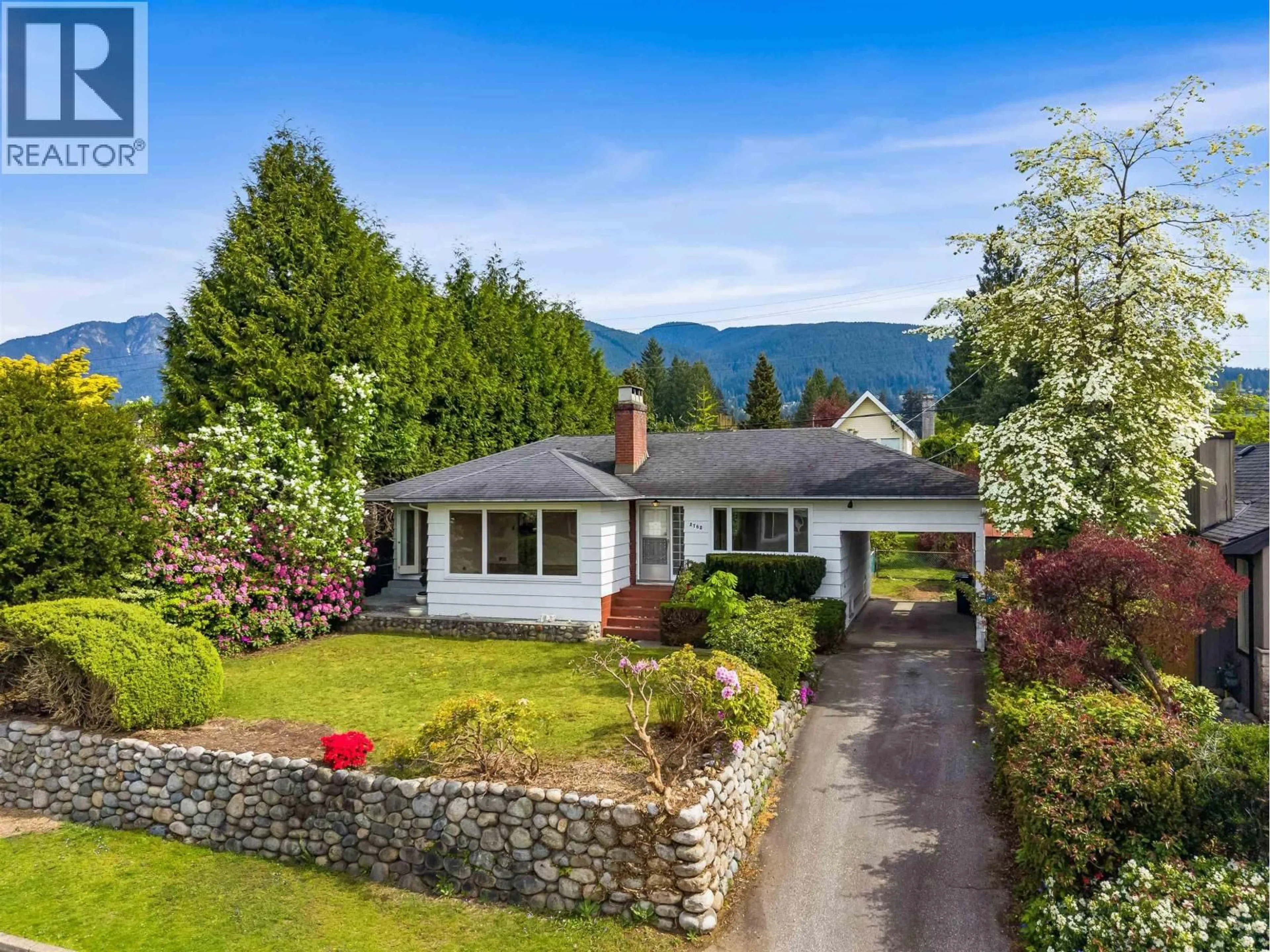 A pic from outside/outdoor area/front of a property/back of a property/a pic from drone, mountain view for 2762 NEWMARKET DRIVE, North Vancouver British Columbia V7R2T4