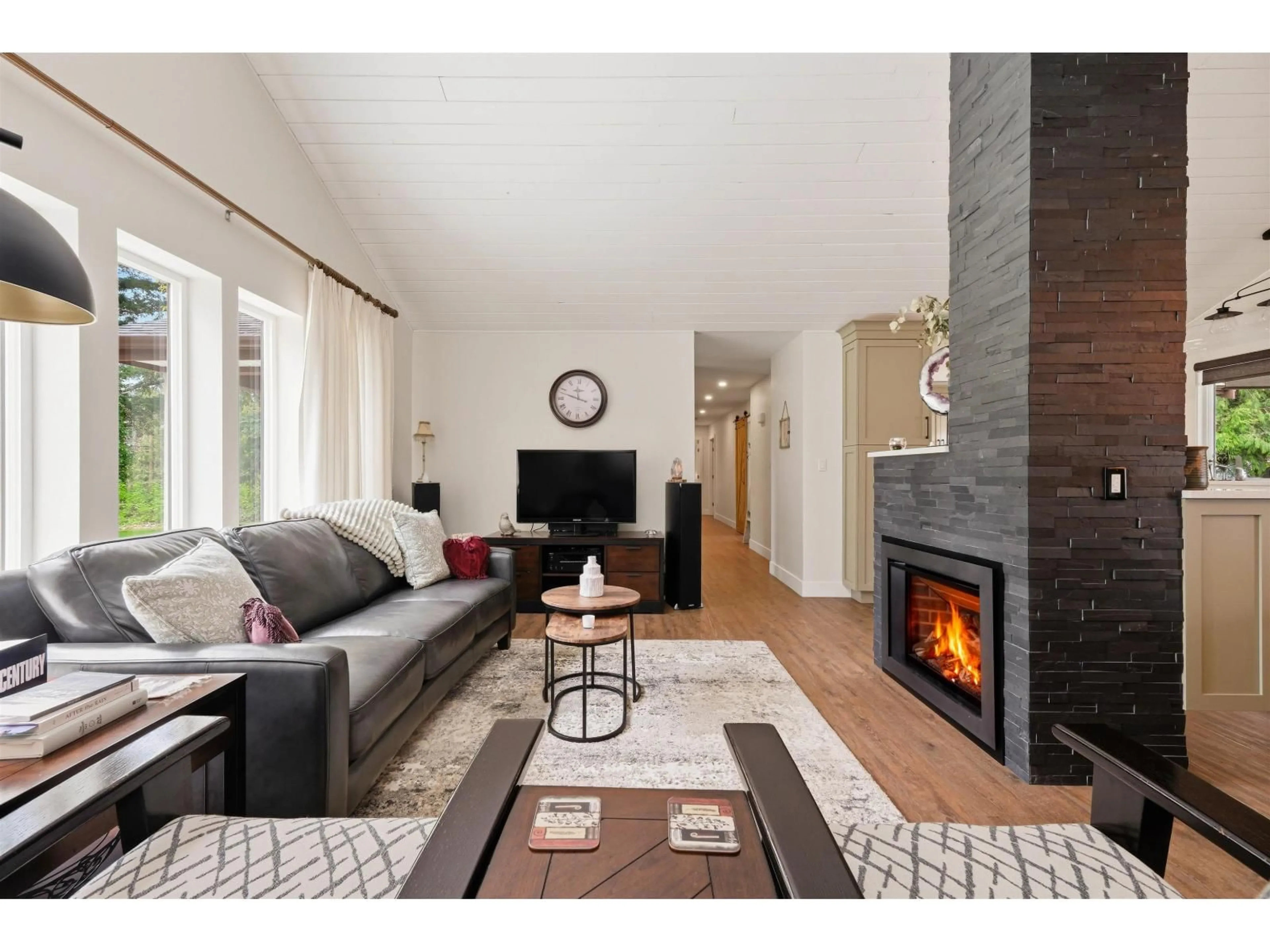 Living room with furniture, wood/laminate floor for 23541 24 AVENUE, Langley British Columbia V2Z3A2