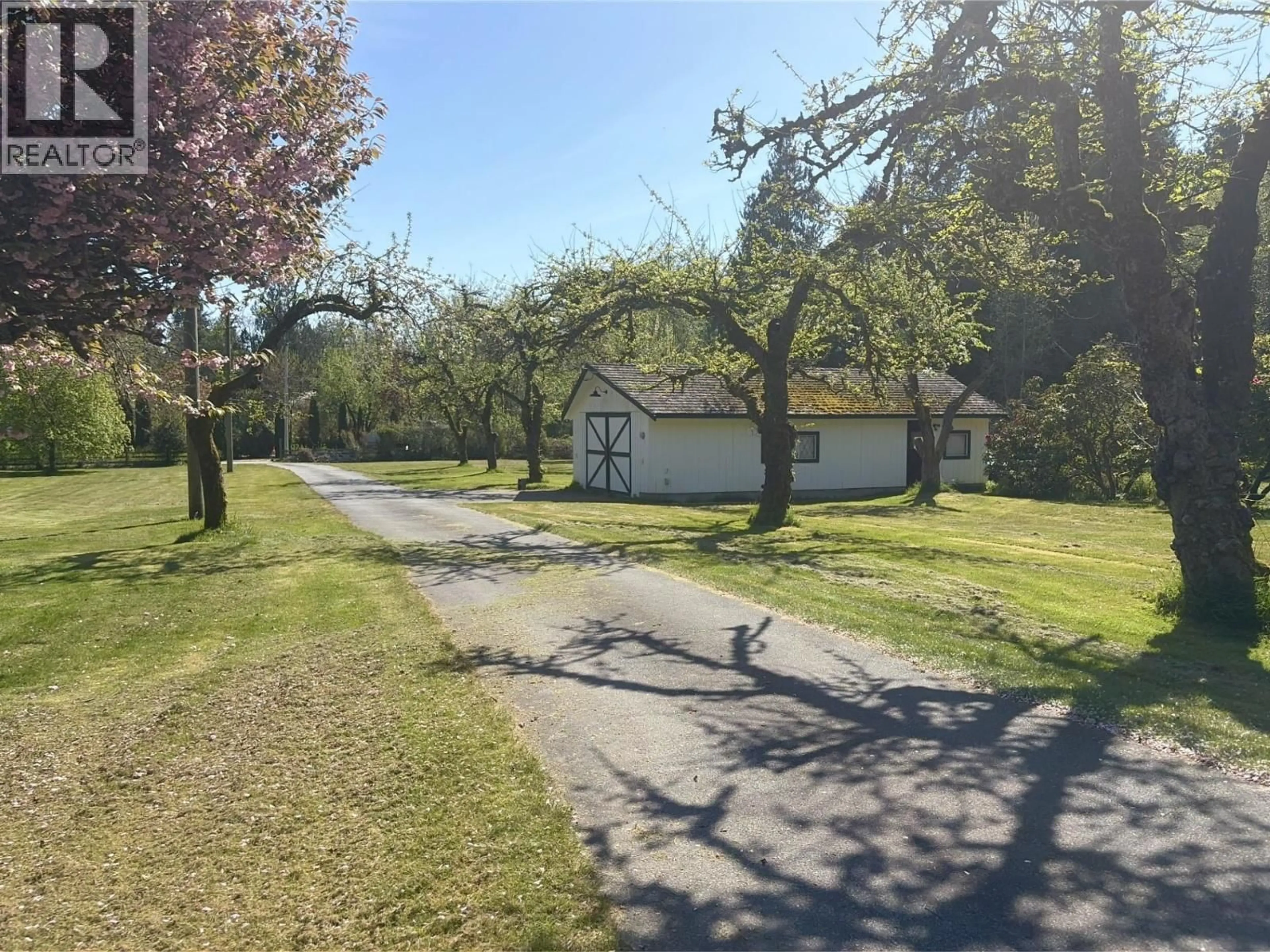 A pic from outside/outdoor area/front of a property/back of a property/a pic from drone, street for 1346 RUSSELL ROAD, Gibsons British Columbia V0N1V2