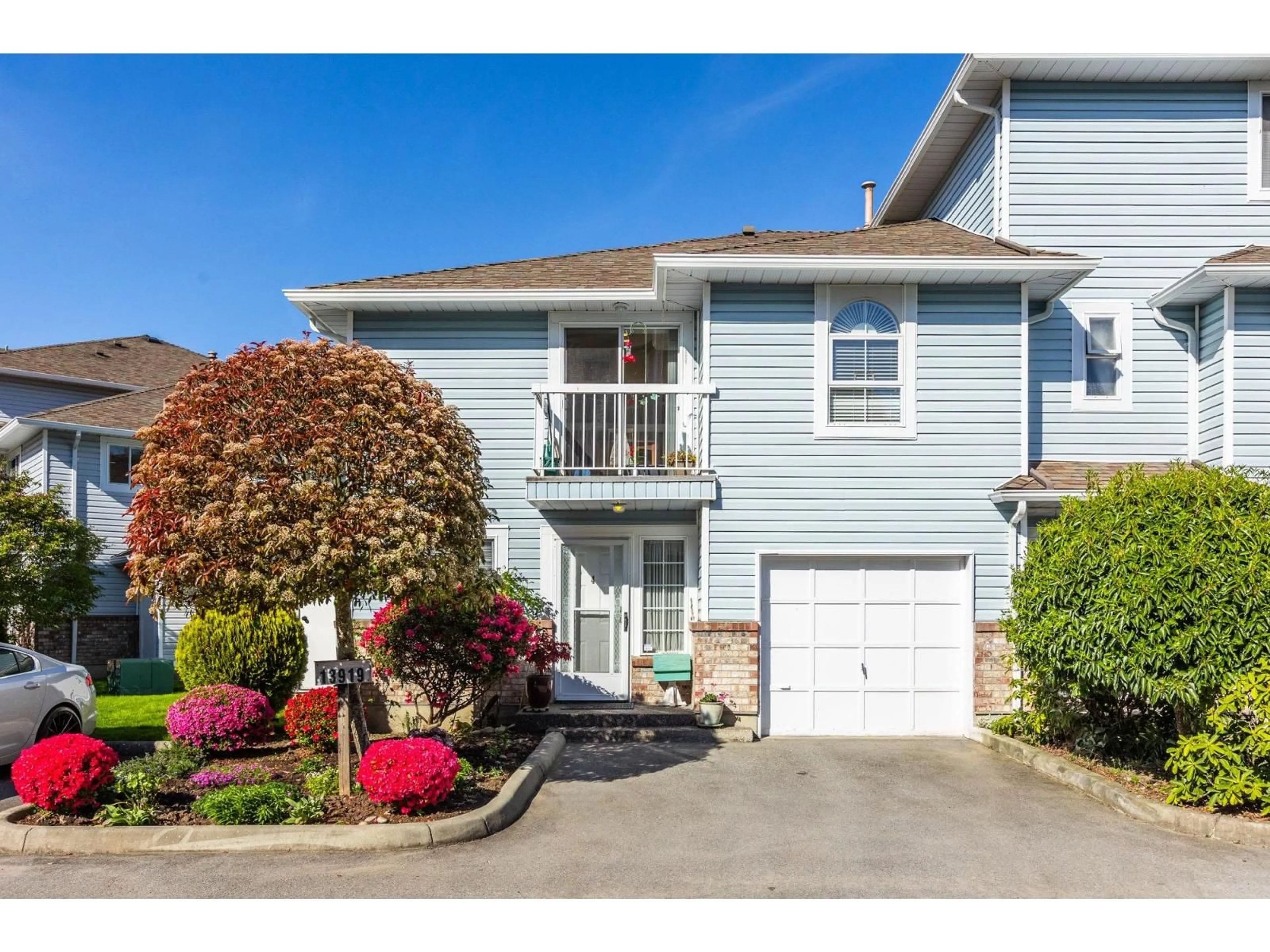 Home with vinyl exterior material, street for 4 - 13919 70 AVENUE, Surrey British Columbia V3W0A1