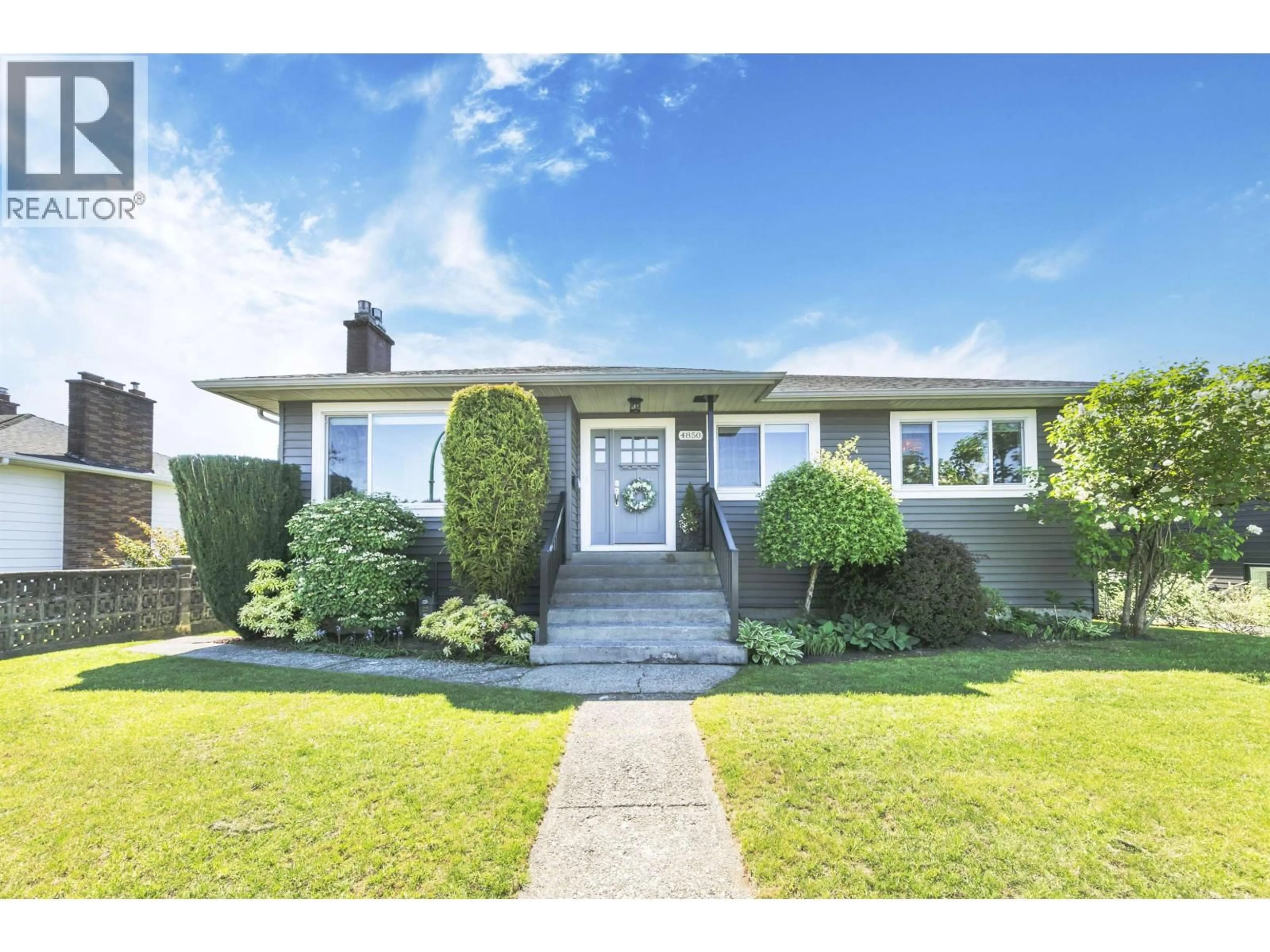 Home with vinyl exterior material, street for 4850 HIGHLAWN DRIVE, Burnaby British Columbia V5C3T1