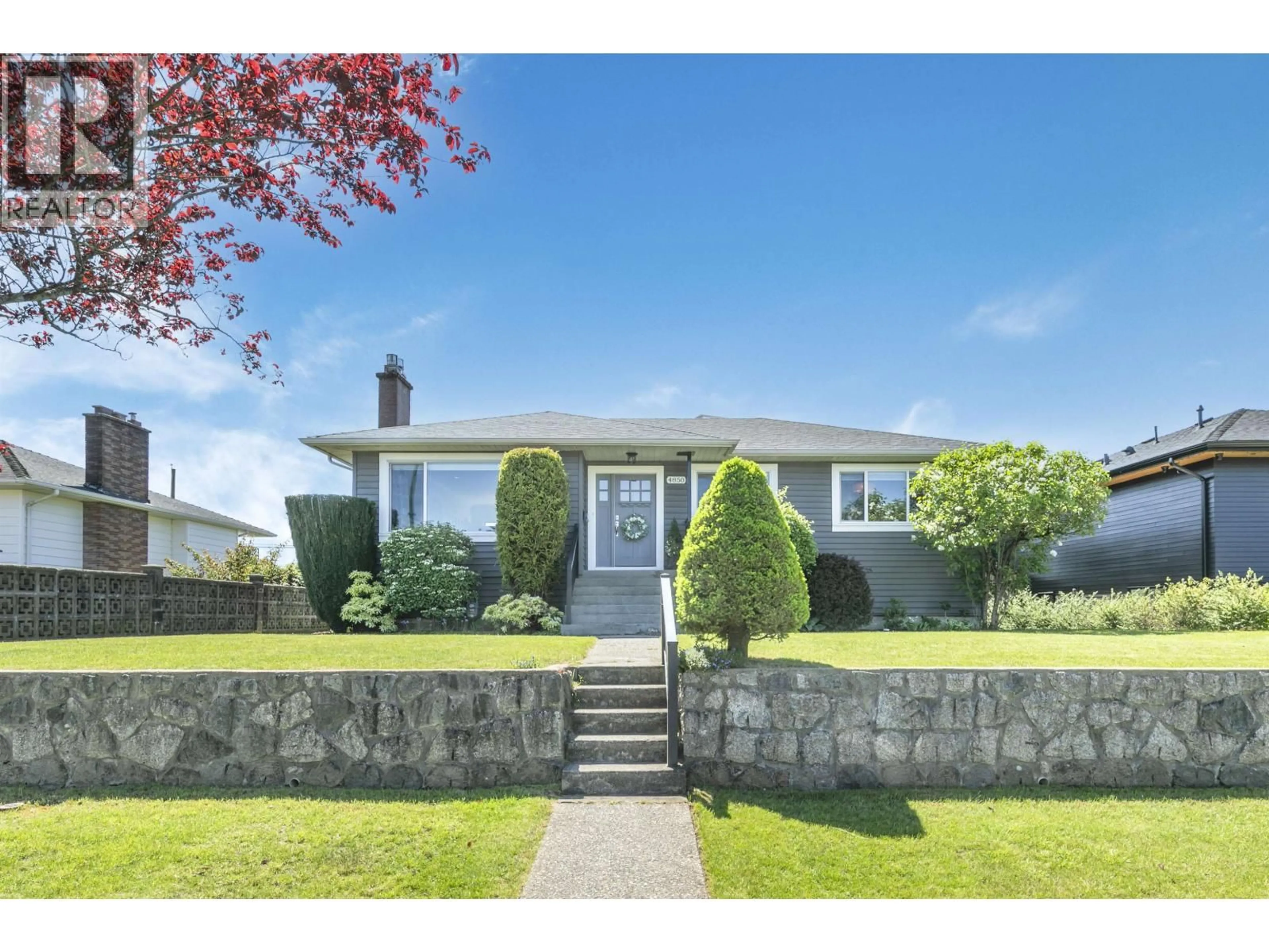 Home with vinyl exterior material, street for 4850 HIGHLAWN DRIVE, Burnaby British Columbia V5C3T1