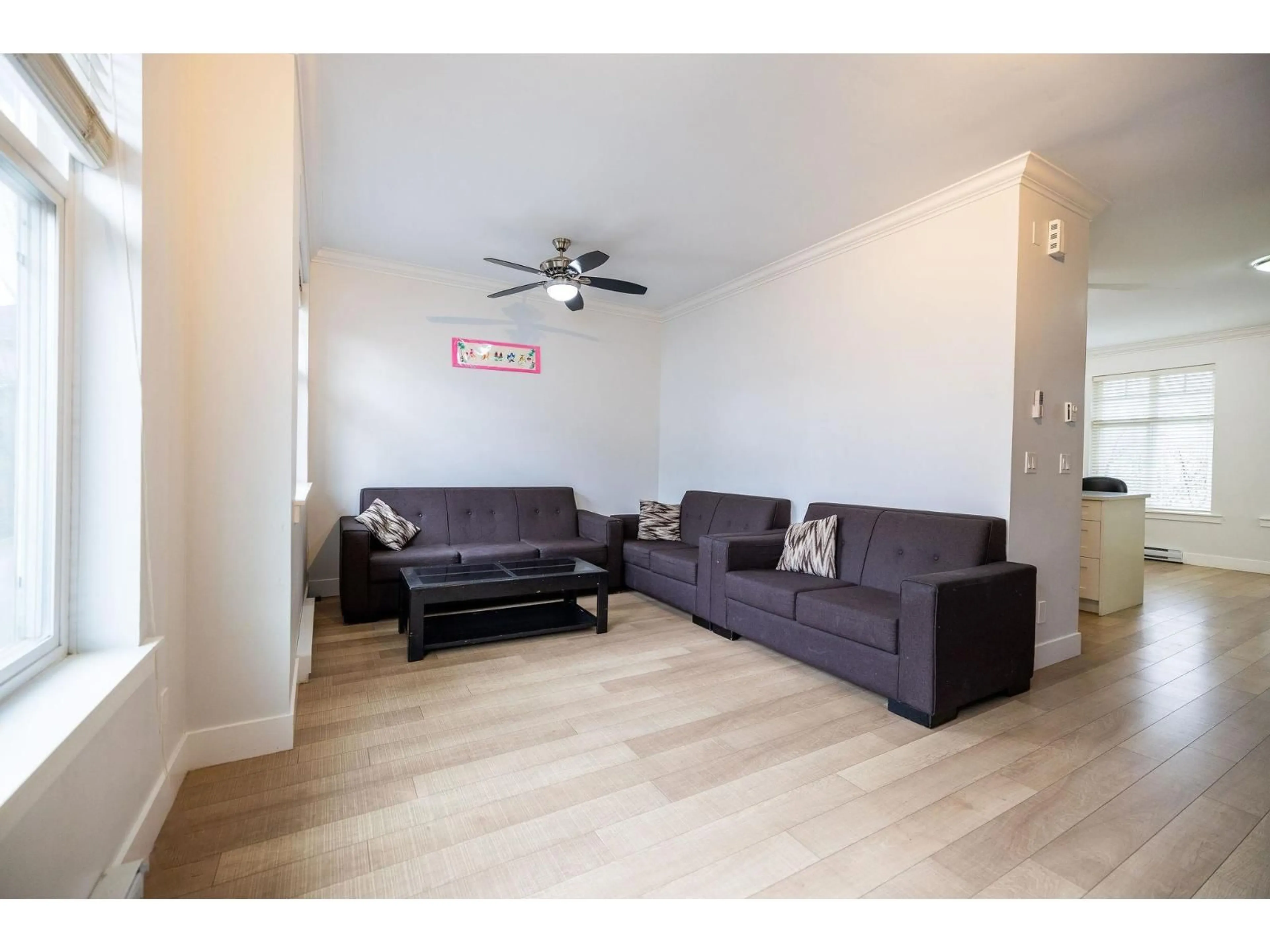 Living room with furniture, wood/laminate floor for 7 - 6350 142 STREET, Surrey British Columbia V3X1B8